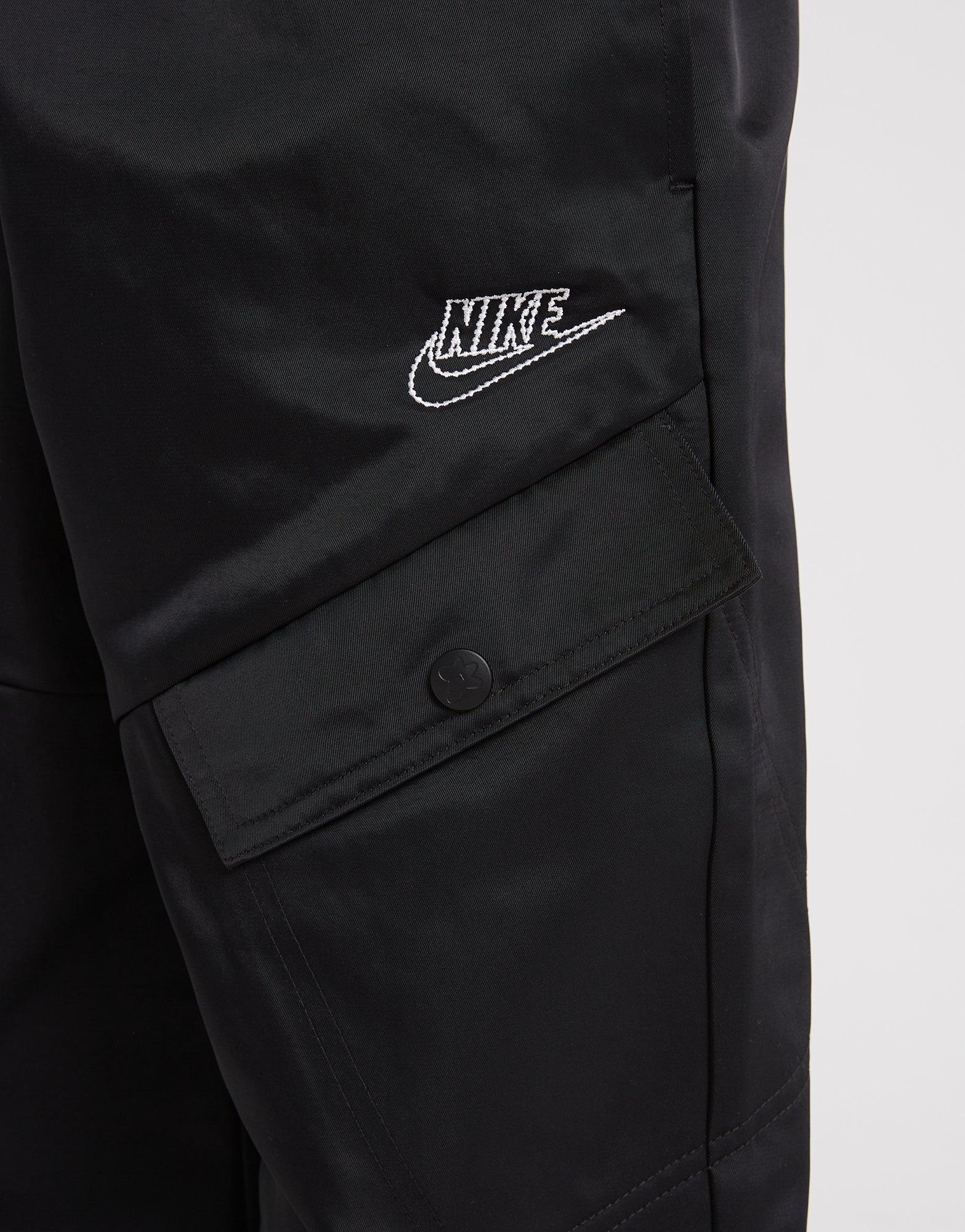 Dětské kalhoty NIKE KALHOTY  G NSW PANT NVLTY CAPSULE G FN8638-010 Černá