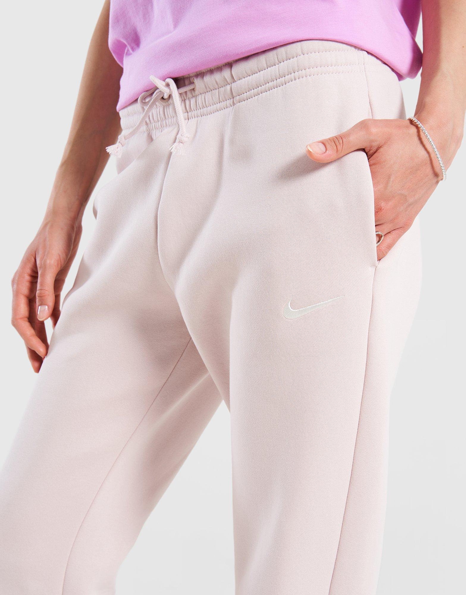 Moteriškos kelnės NIKE KELNĖS W NSW PHNX FLC MR PANT STD FZ7626-667 Rusva