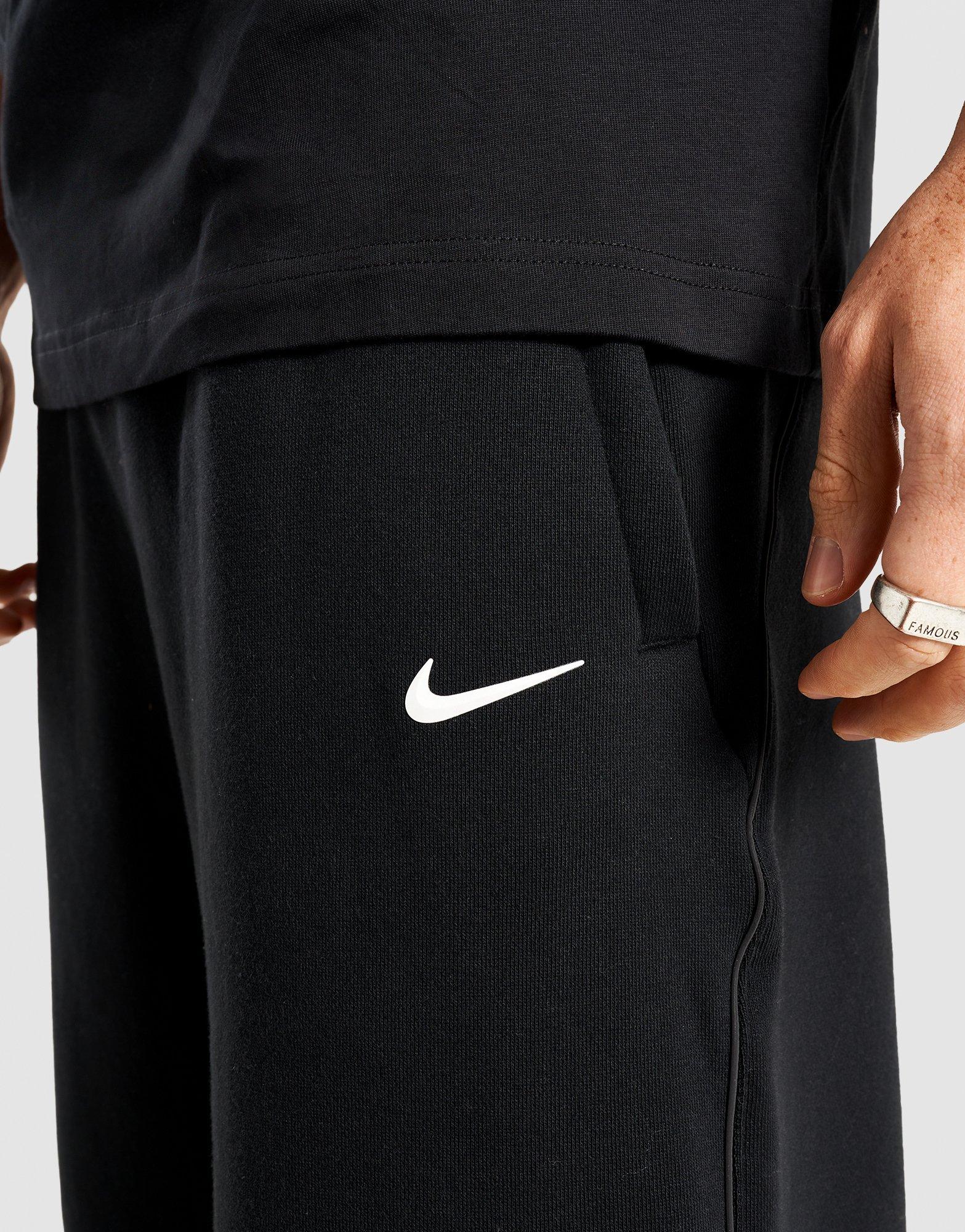 NIKE SPODNIE M NRG NOCTA CS PANT FLC HM5764-010 Czarny