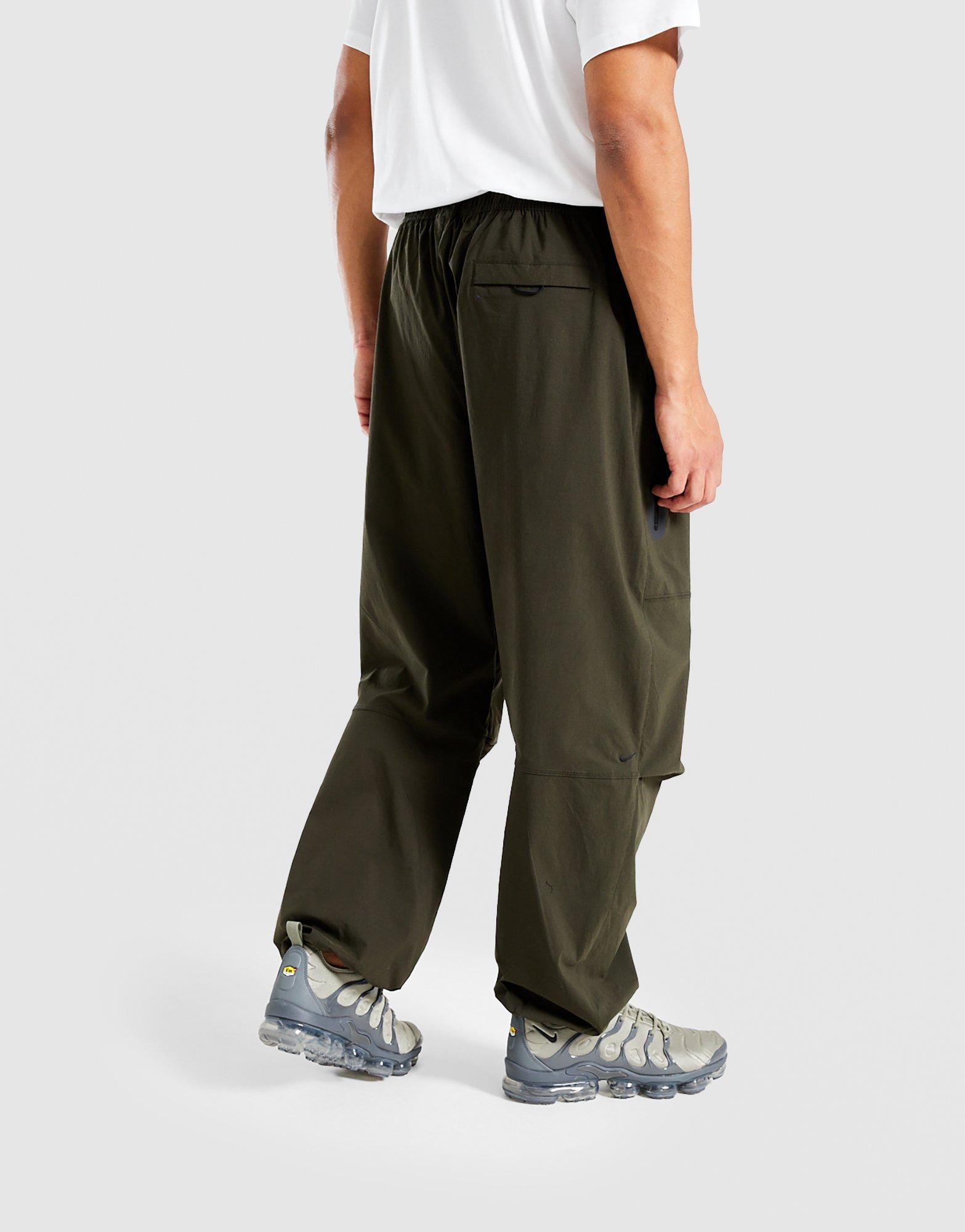 NIKE SPODNIE M NK TCH WVN PANT OS HM7158-356 Szary