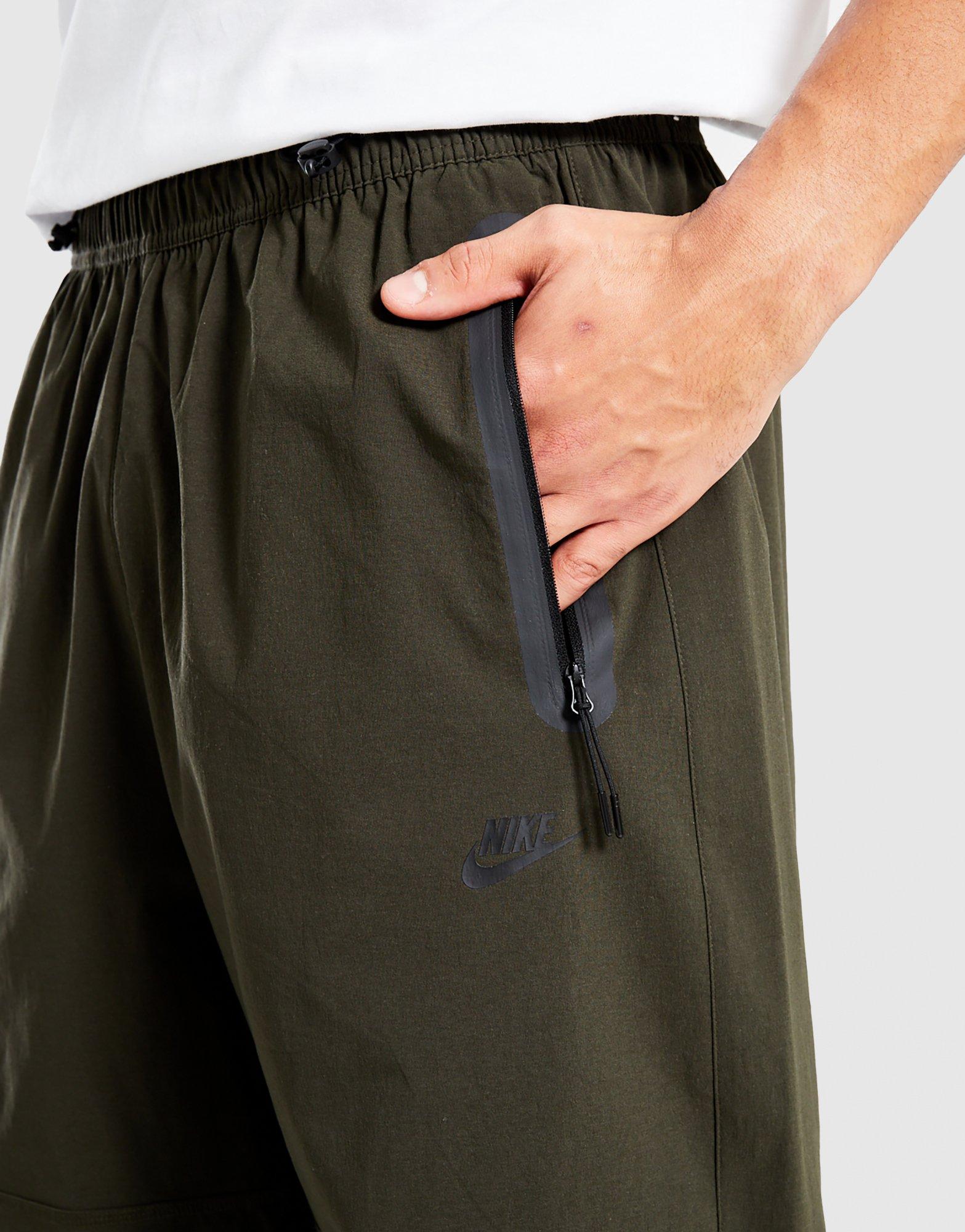 NIKE SPODNIE M NK TCH WVN PANT OS HM7158-356 Szary