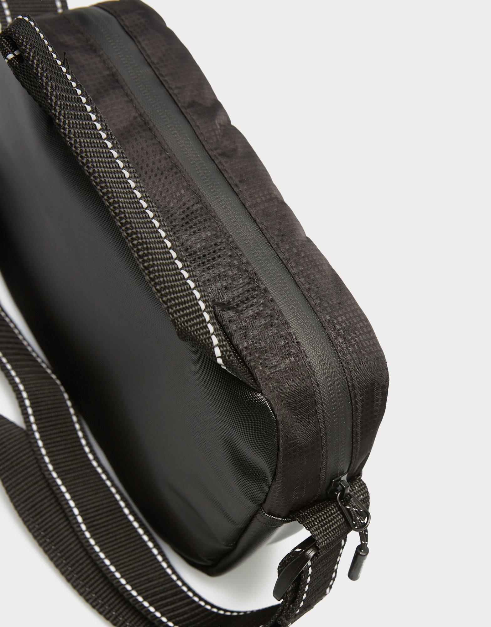 Női sporttáská HOODRICH TÁSKA PEAK CROSSBODY BAG HR20250049 Fekete