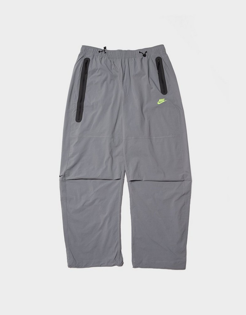 Pantaloni pentru bărbați NIKE PANTALONI  M NK TCH WVN PNT OS HV6515-065 Gri