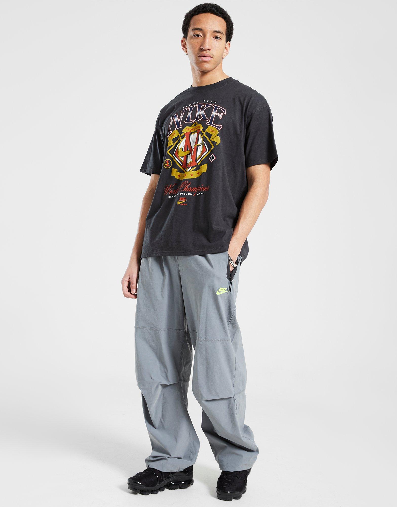 Pánske nohavice NIKE NOHAVICE  M NK TCH WVN PNT OS HV6515-065 Sivá