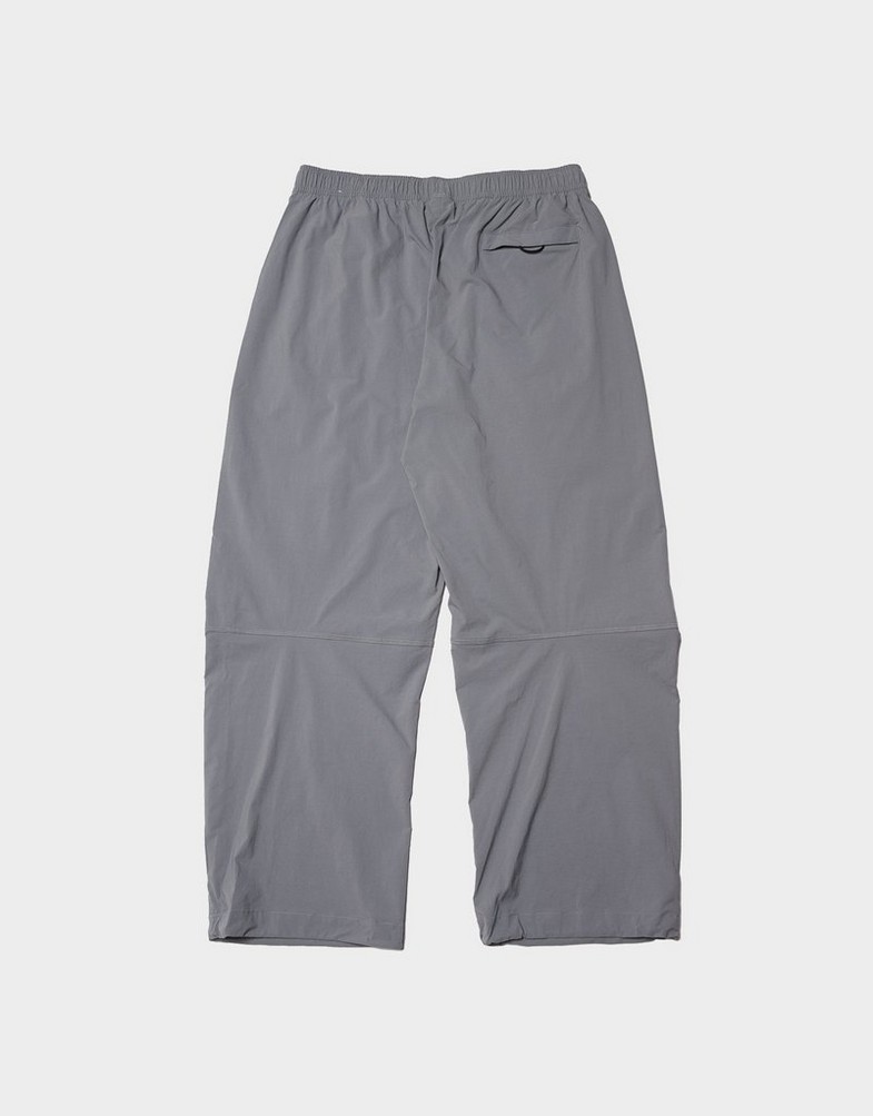 Pantaloni pentru bărbați NIKE PANTALONI  M NK TCH WVN PNT OS HV6515-065 Gri