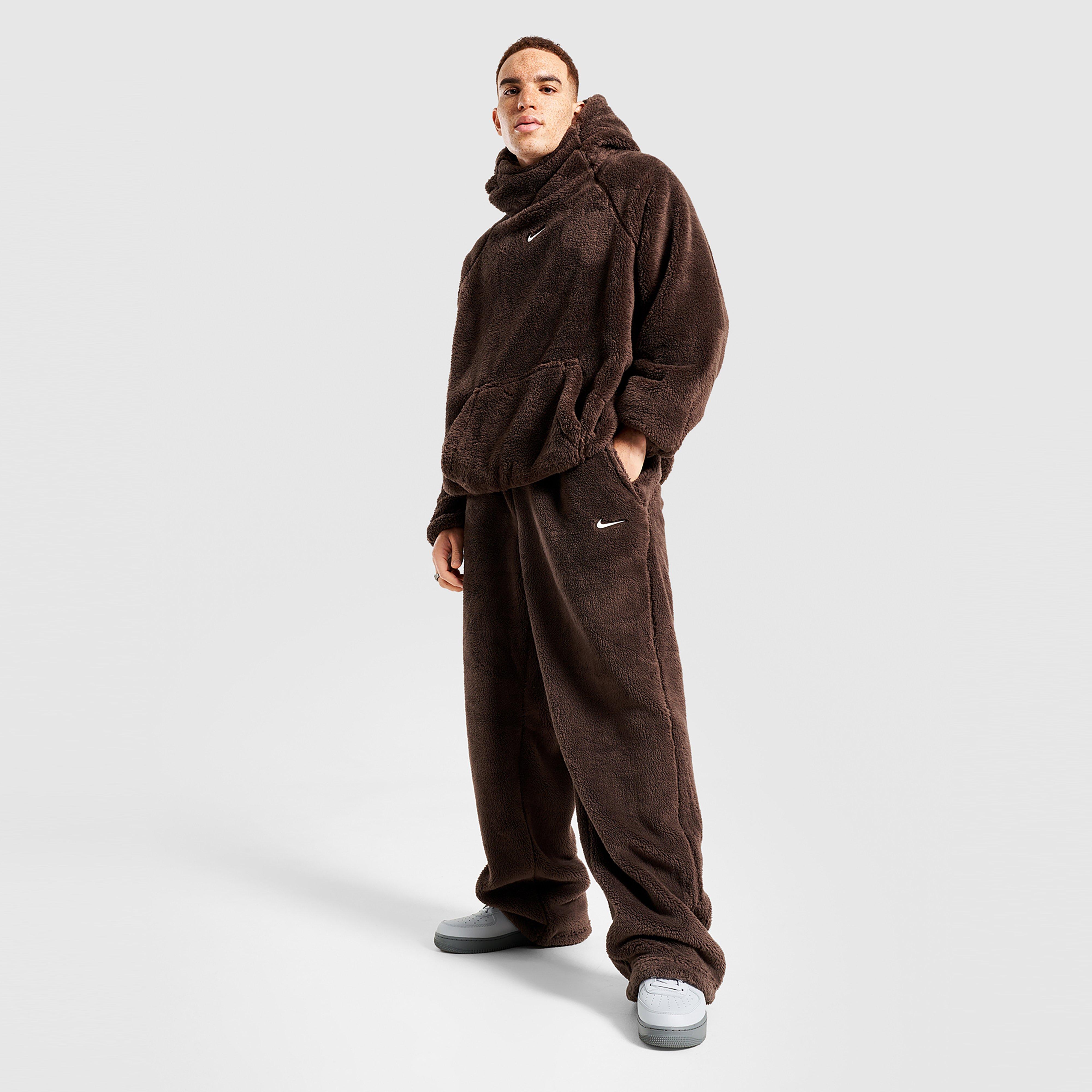 Férfi melegítőnadrág és jogger NIKE NADRÁG M NRG NOCTA CS PANT FL CM