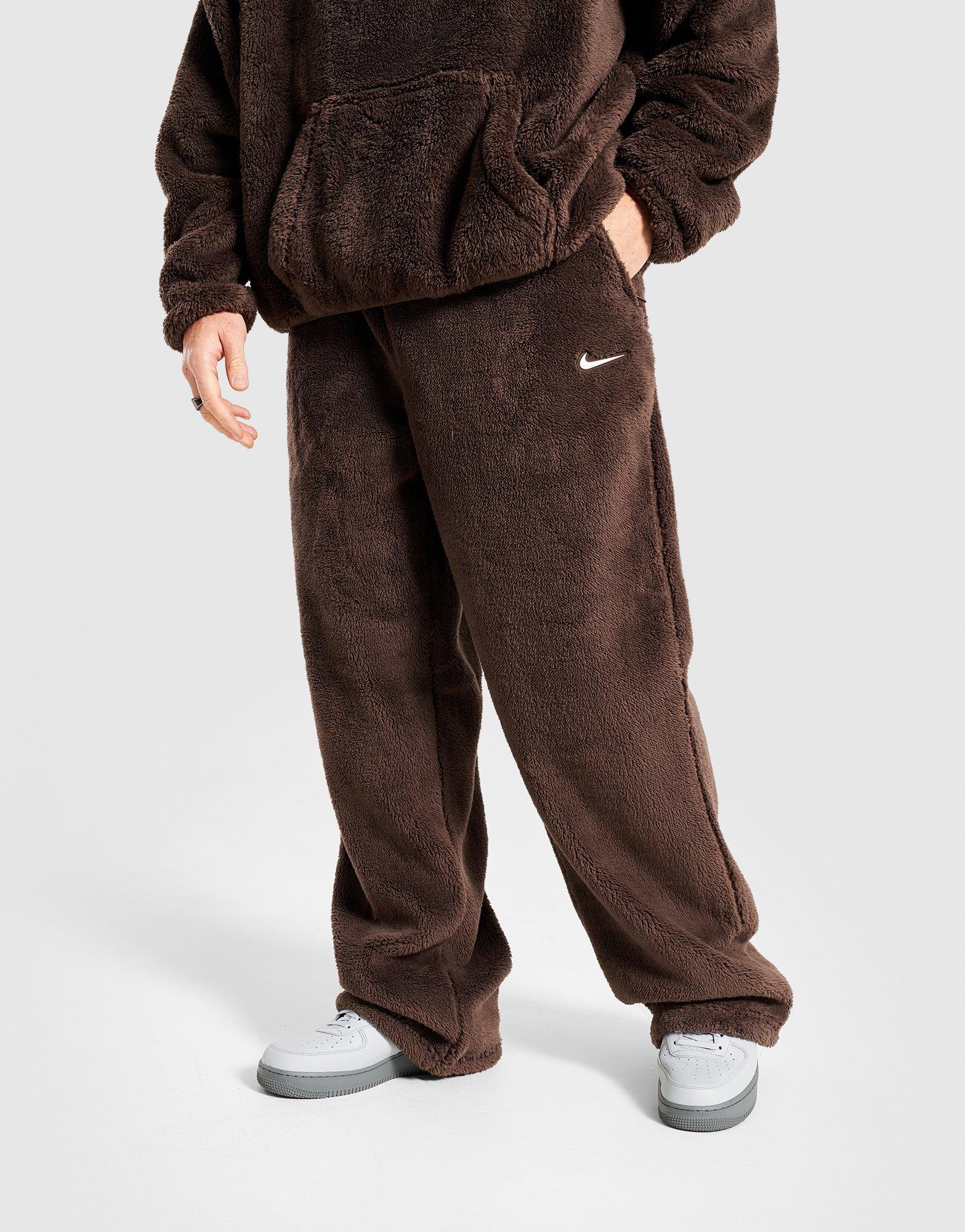 Pantaloni pentru bărbați NIKE PANTALONI  M NRG NOCTA CS PANT FL CM IB0261-237 Maro