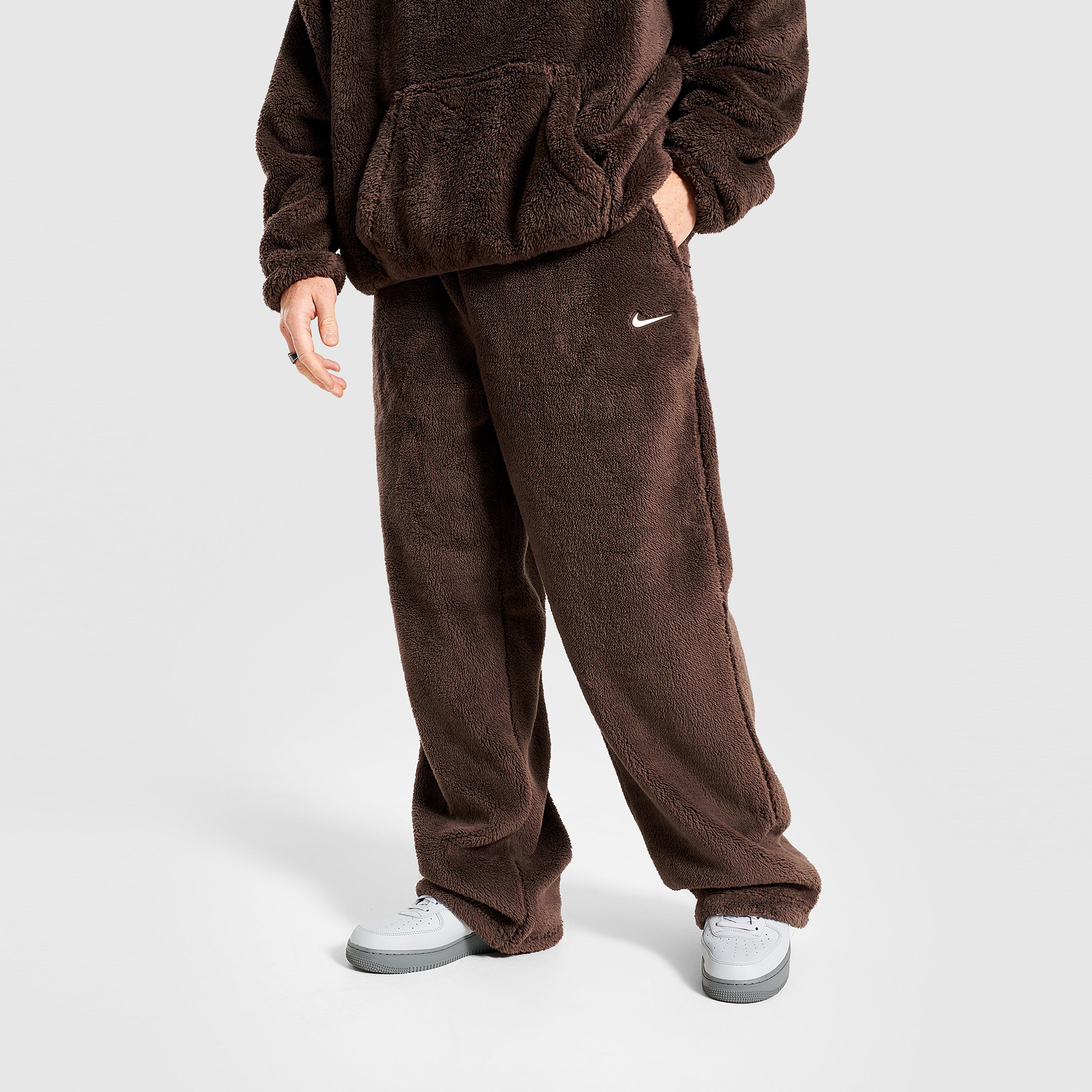 Férfi melegítőnadrág és jogger NIKE NADRÁG M NRG NOCTA CS PANT FL CM