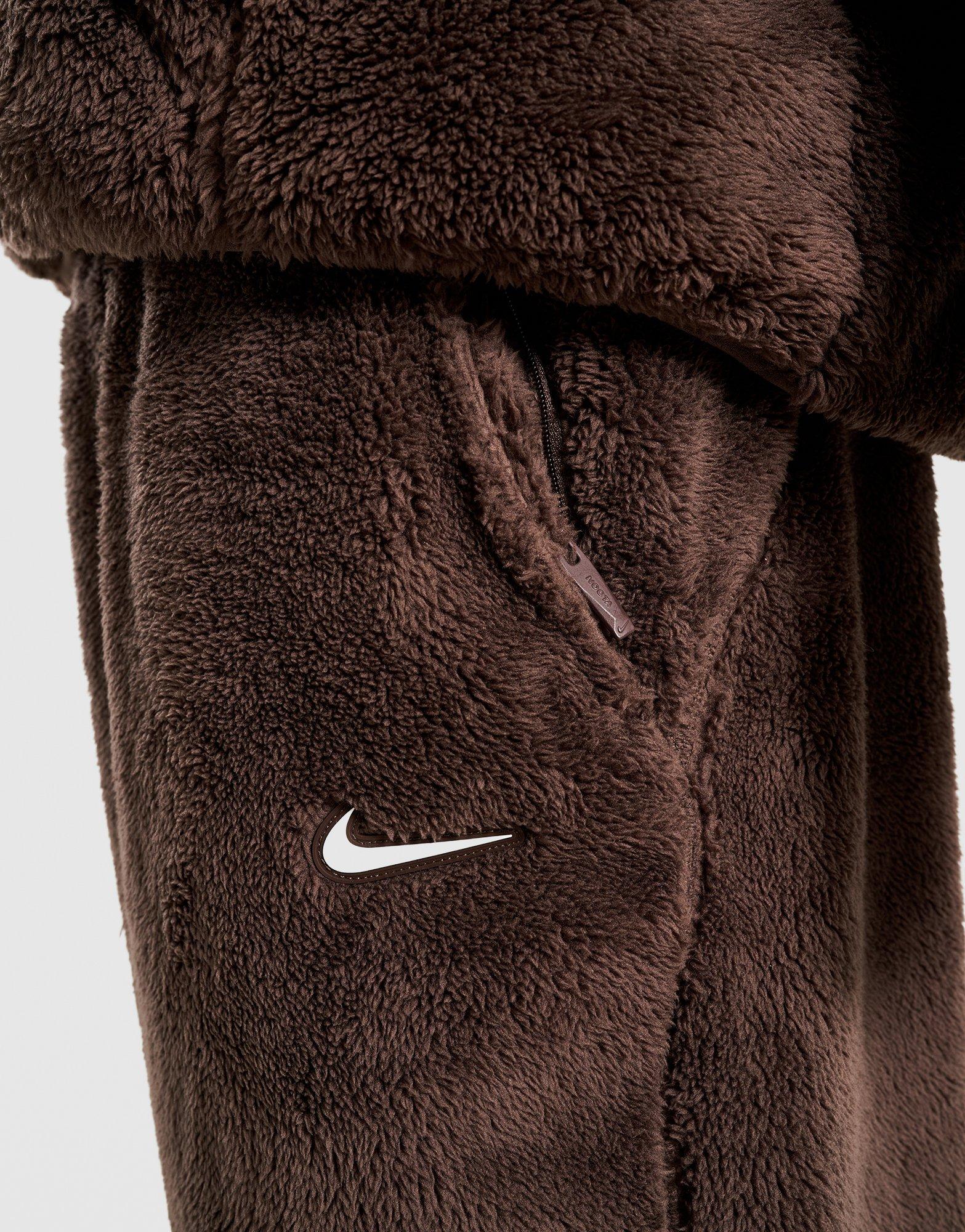 Pantaloni pentru bărbați NIKE PANTALONI  M NRG NOCTA CS PANT FL CM IB0261-237 Maro