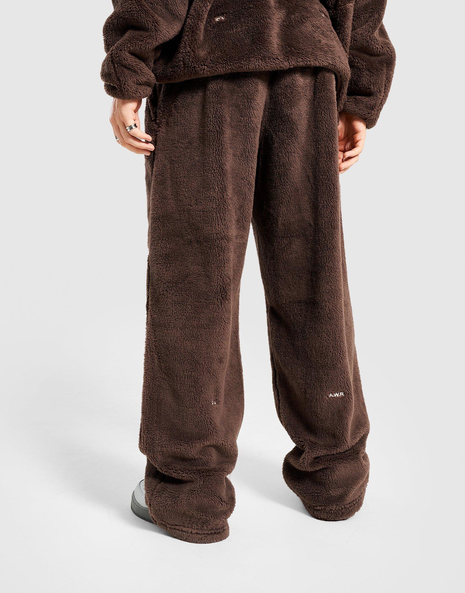 Pantaloni pentru bărbați NIKE PANTALONI  M NRG NOCTA CS PANT FL CM IB0261-237 Maro