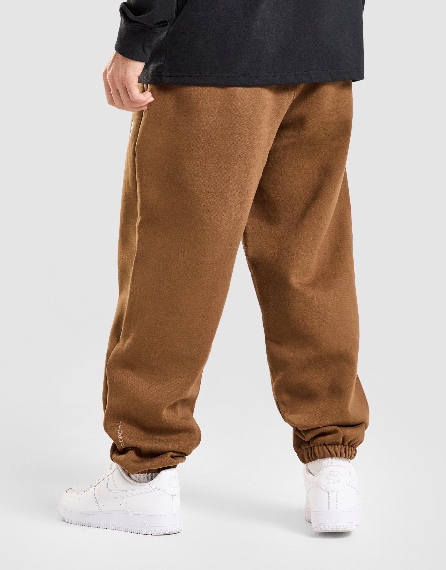 NIKE SPODNIE U ACG TUFF FLC PANT TRIANGLE IH0717-235 Brązowy