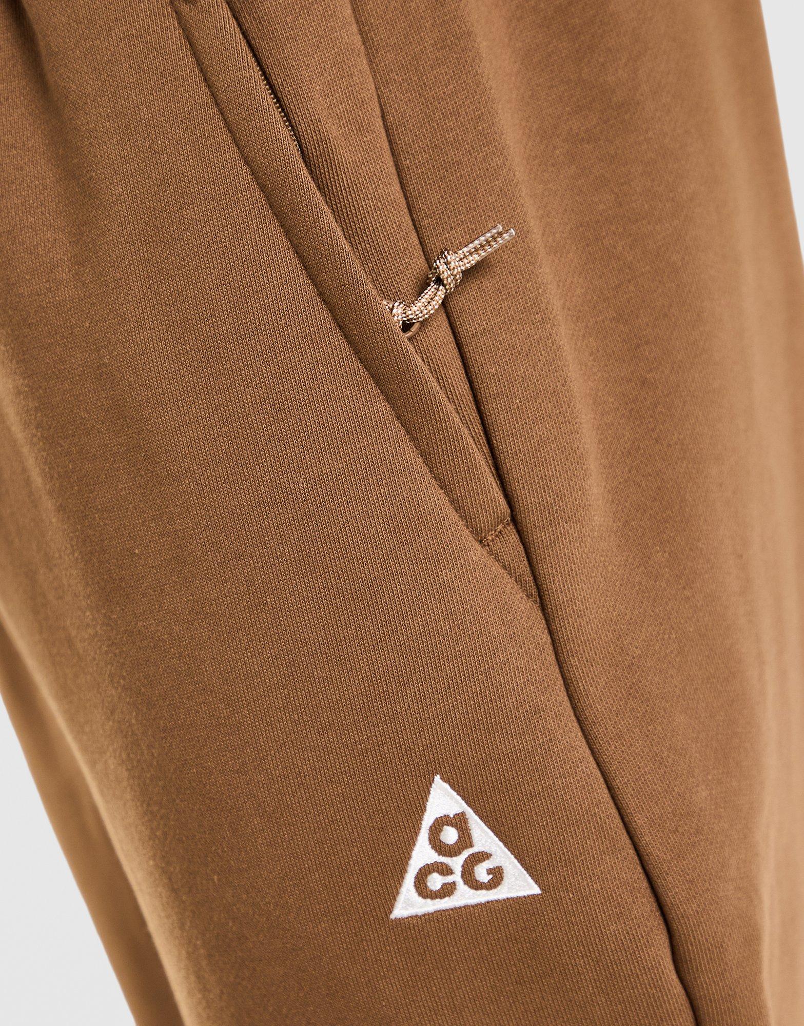 NIKE SPODNIE U ACG TUFF FLC PANT TRIANGLE IH0717-235 Brązowy