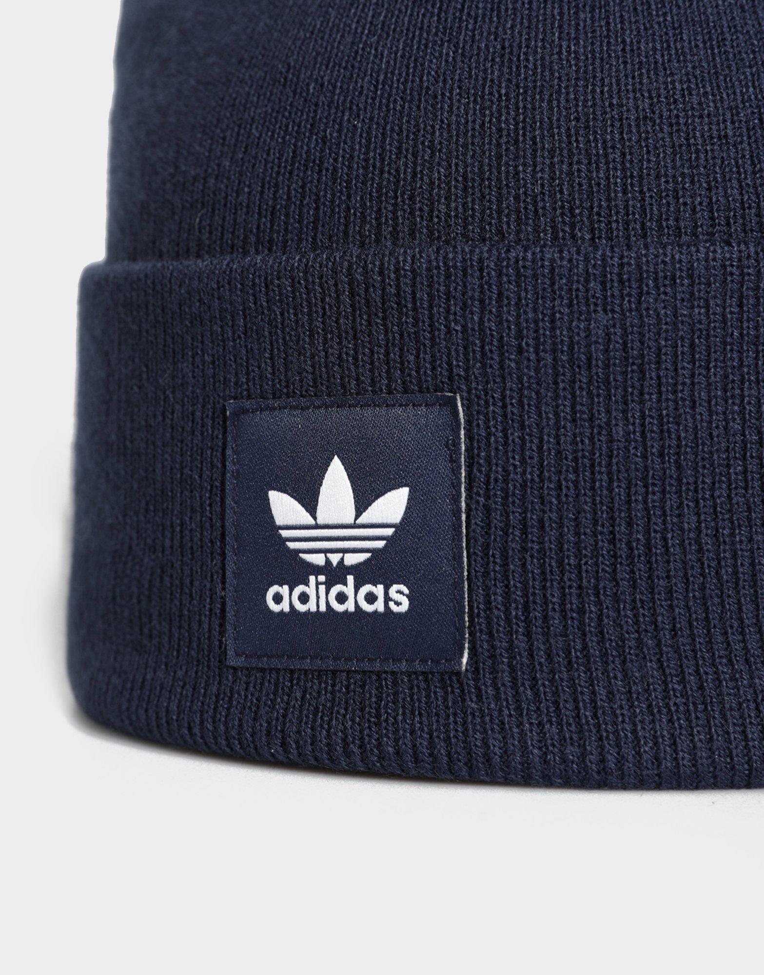 Női téli sapká ADIDAS SAPKA TÉLI AC CUFF KNIT IL4878 Sötétkék