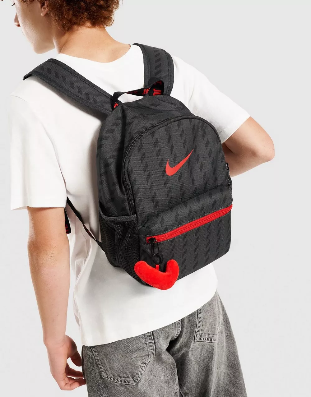 NIKE РЮКЗАК Y NK JDI MINI BKPK - SU26 AOP, фото 1 з 4