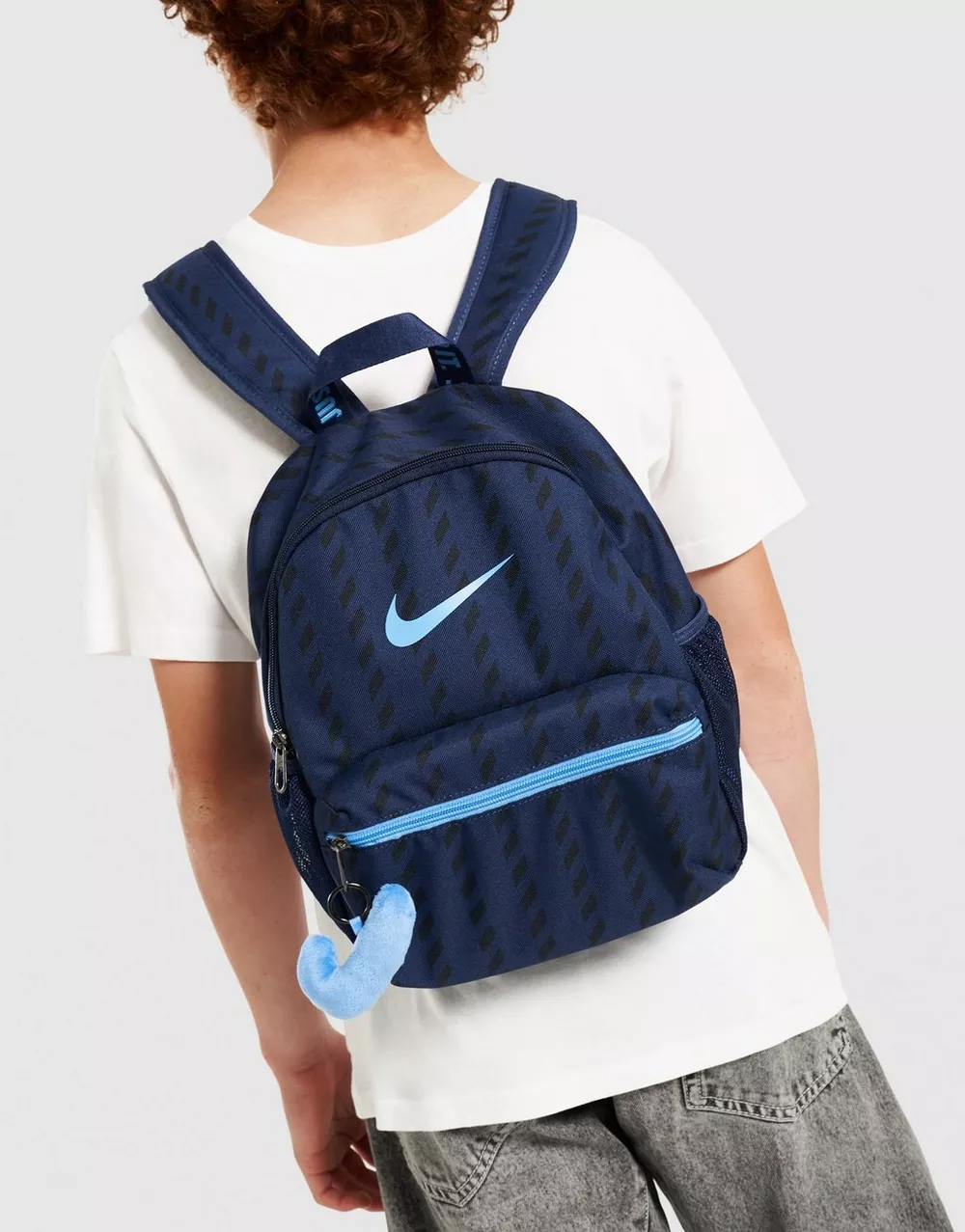 NIKE РЮКЗАК Y NK JDI MINI BKPK - SU26 AOP, фото 1 з 4