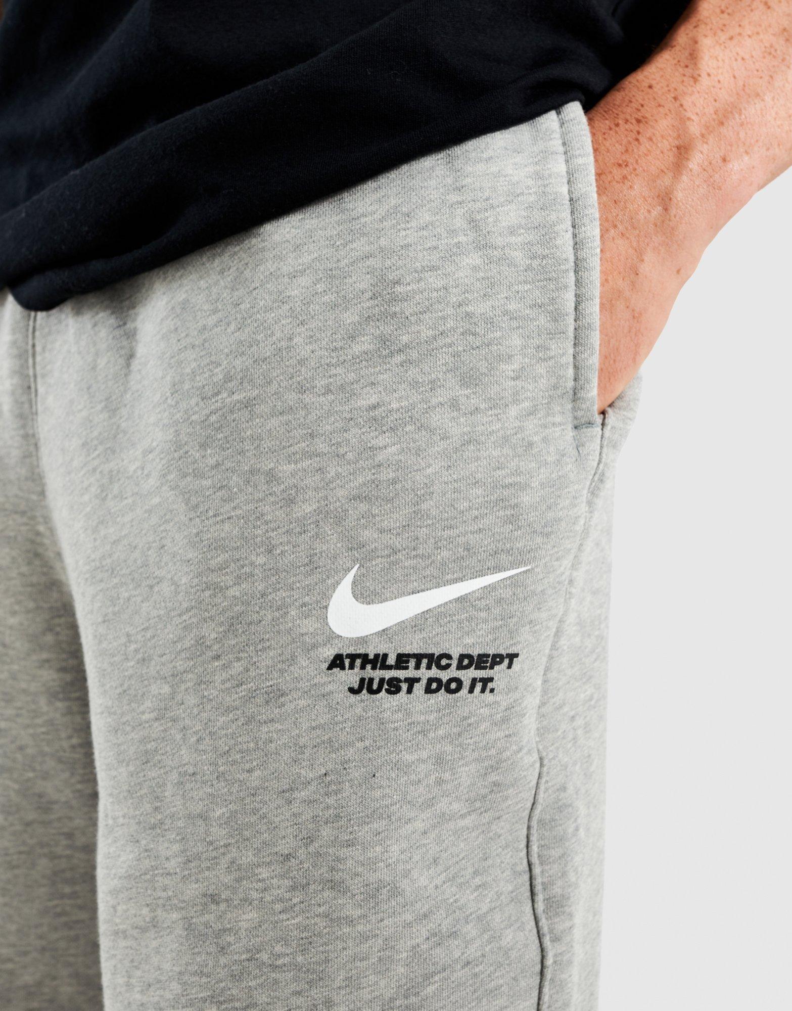 NIKE SPODNIE M NK CLUB BB FLC BOTTOM SILHO IQ2759-063 Szary