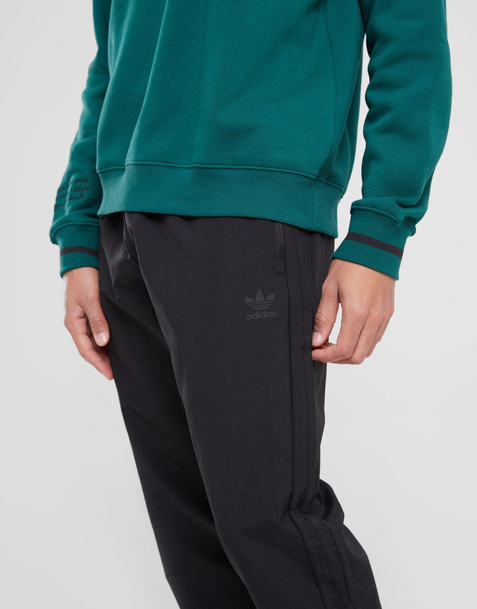 Vyriškos kelnės ADIDAS KELNĖS TREF ESS JOG BLK OTB** IZ2108 Juoda