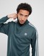 ADIDAS КОФТА НА БЛИСКАВЦІ SSTAR TT M.GREEN