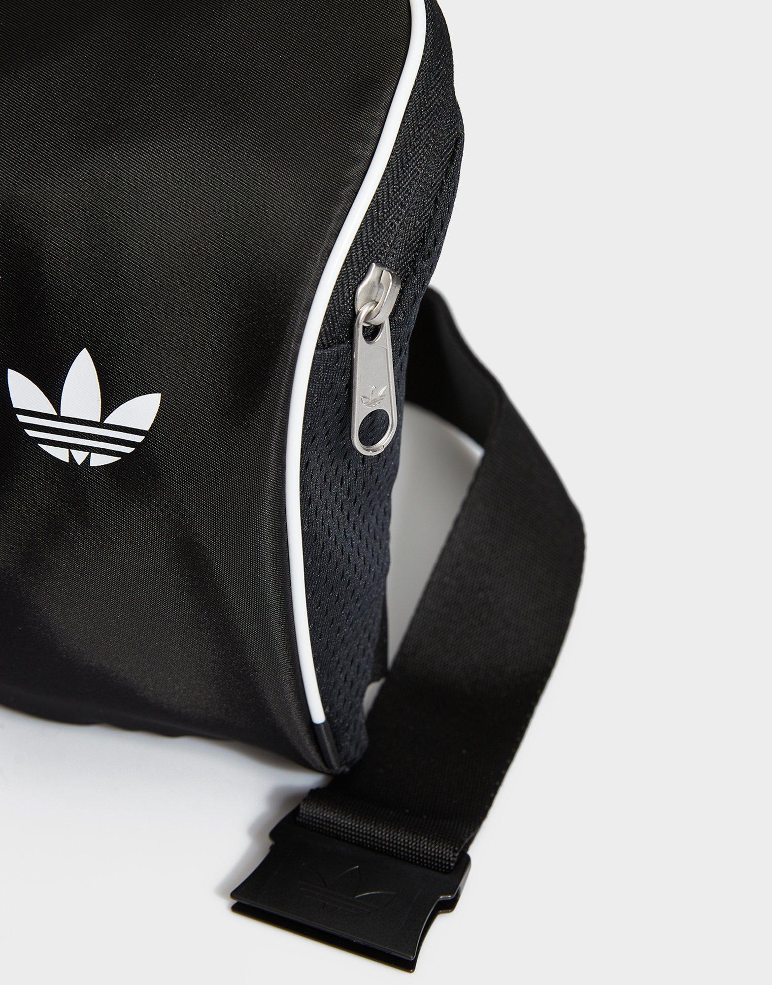 Női sporttáská ADIDAS TÁSKA TEAMGEIST SMALL ITEM BAG JD5570 Fekete