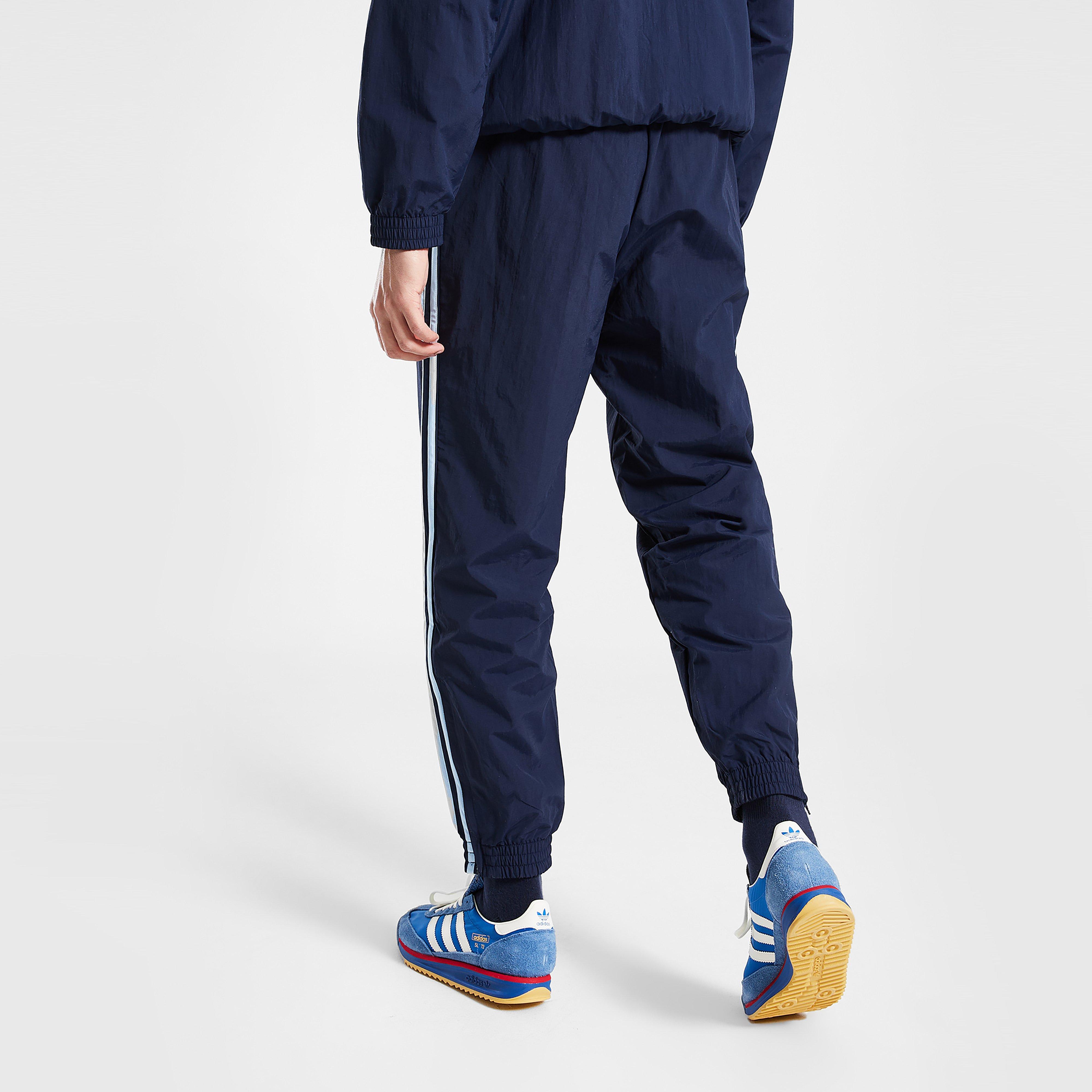 Férfi melegítőnadrág és jogger ADIDAS NADRÁG WOVEN FBIRD TP