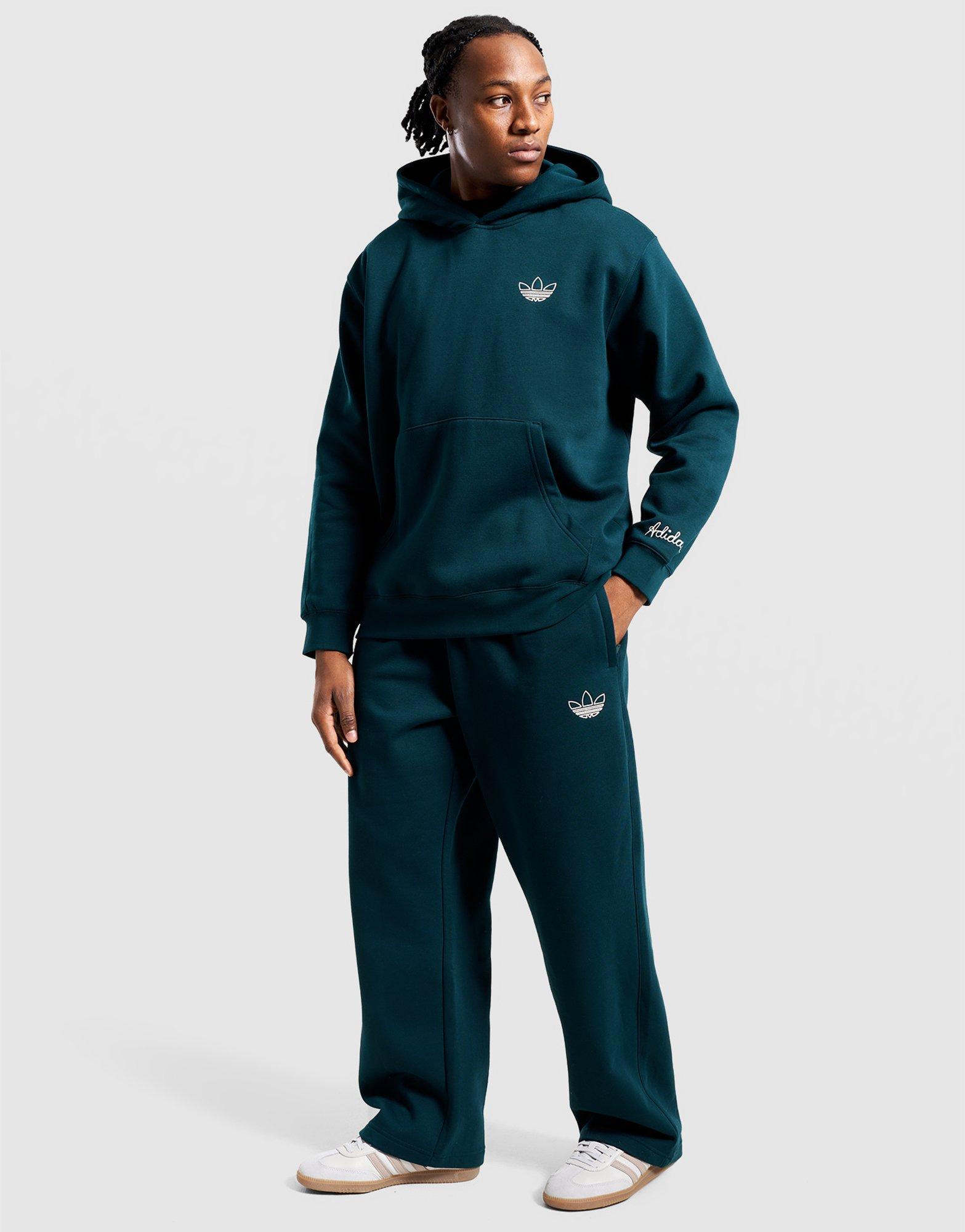 Bluza męska ADIDAS BLUZA Z KAPTUREM GFX HD OS KC6737 Zielony