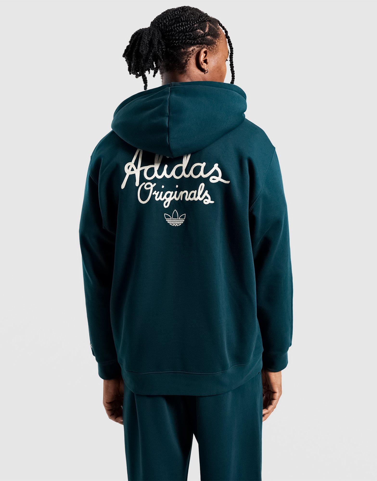 Bluza męska ADIDAS BLUZA Z KAPTUREM GFX HD OS KC6737 Zielony