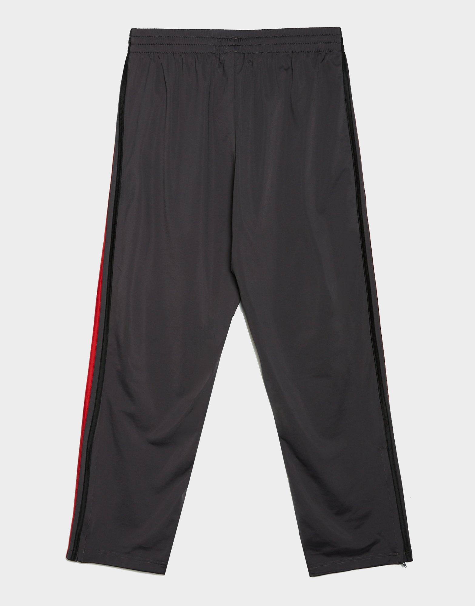 Чоловічі штани ADIDAS ШТАНИ FIREBIRD TP KD3831 Сірий