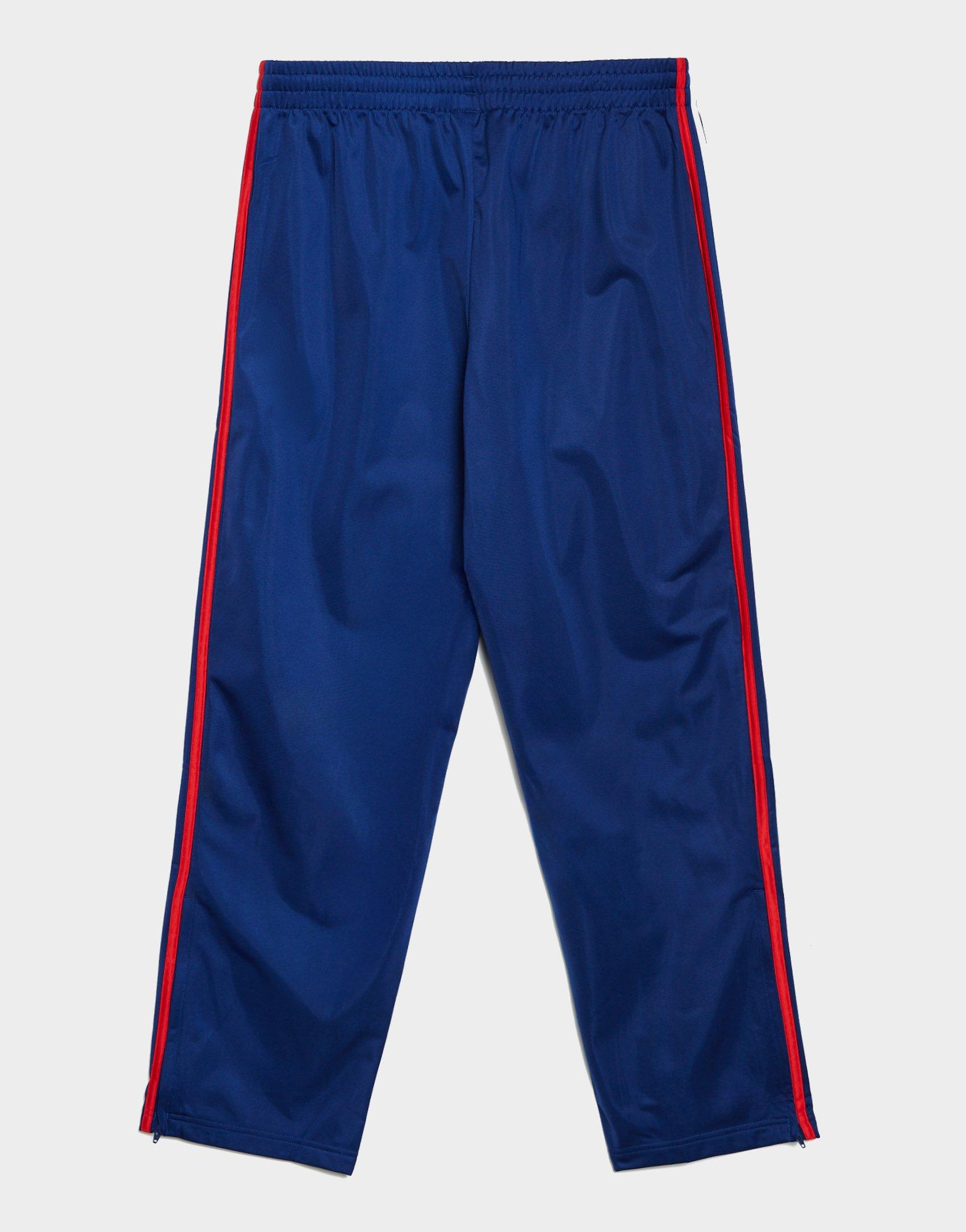 Чоловічі штани ADIDAS ШТАНИ FIREBIRD TP KD3835 Темно-синій