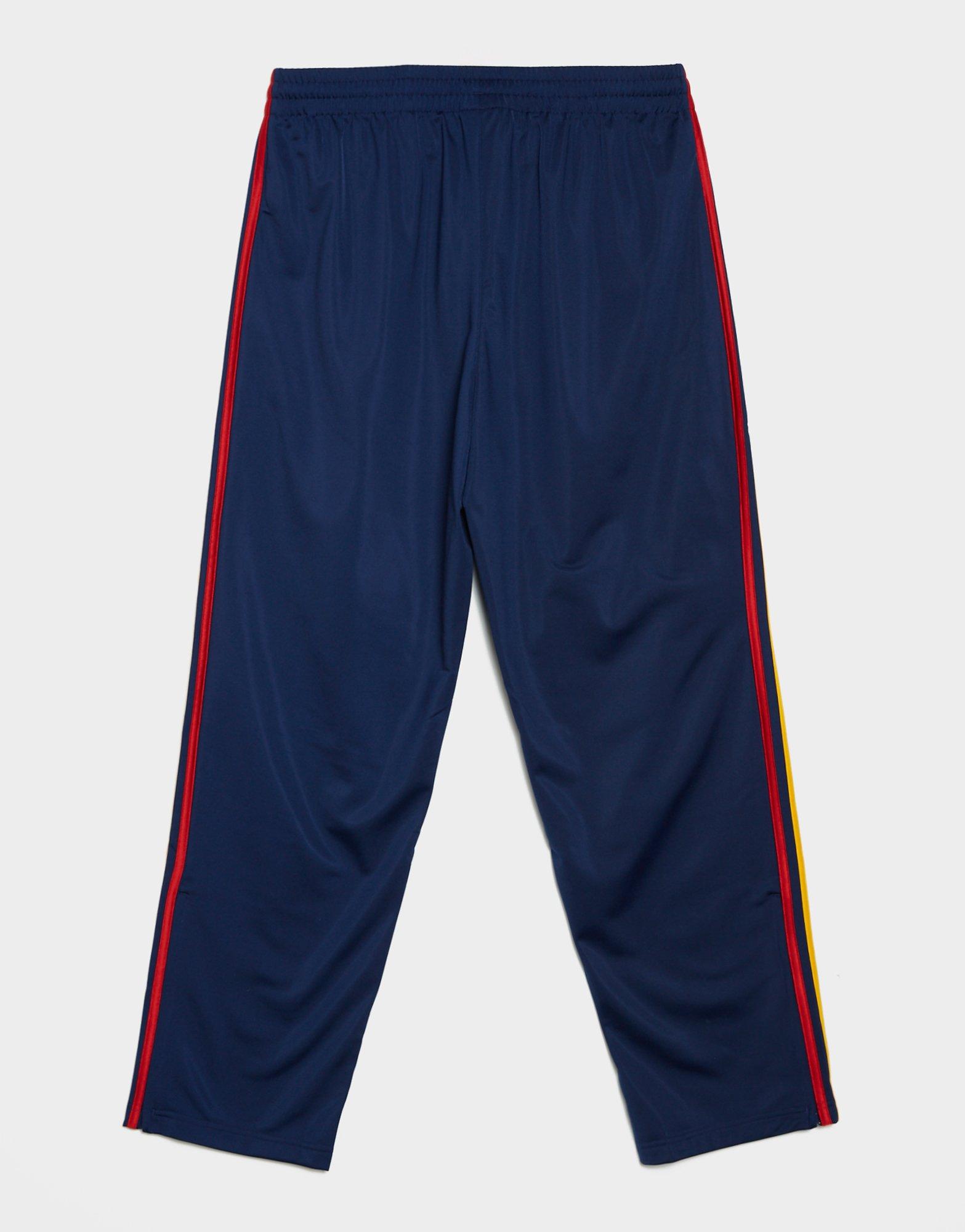 Чоловічі штани ADIDAS ШТАНИ FIREBIRD TP KD3836 Темно-синій