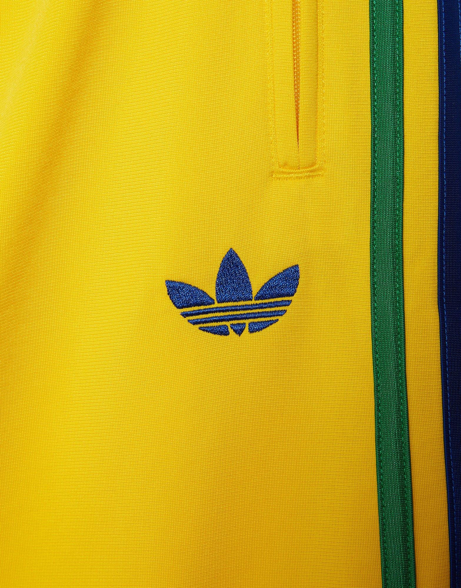 Muške hlače ADIDAS HLAČE FIREBIRD TP KD3840 zlatna