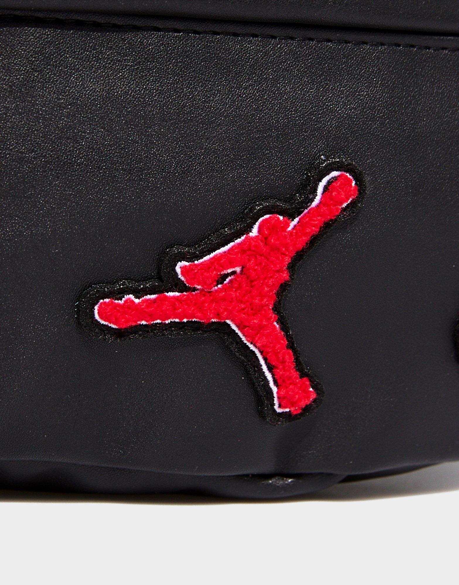 Жіночі сумки і сумочки NIKE HAD СУМКА JAM BOROUGH VARSITY CROSSBODY MA9064023 Чорний