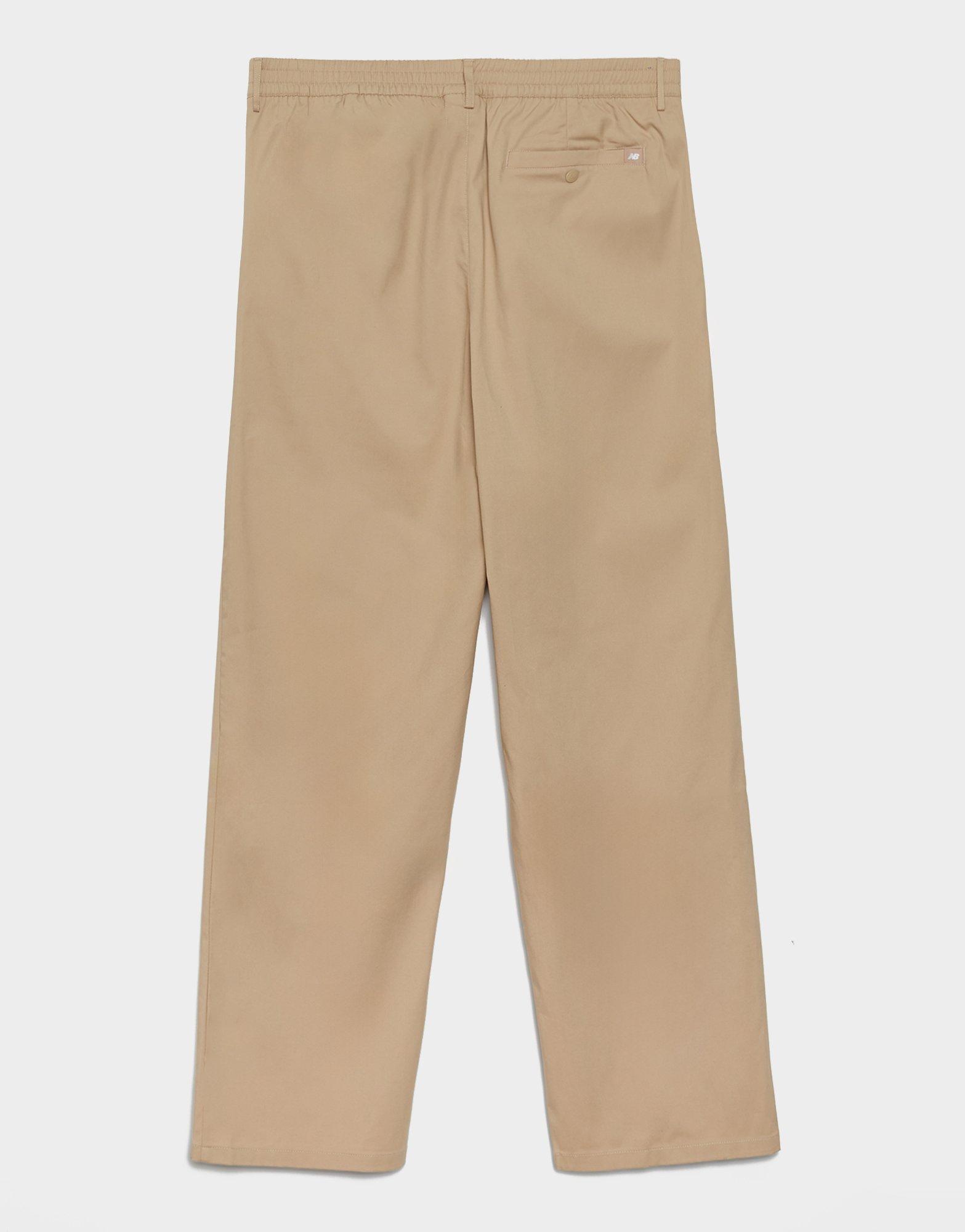 NEW BALANCE SPODNIE ATHLETICS STANDARD PANT 30" MP43560SOT Beżowy