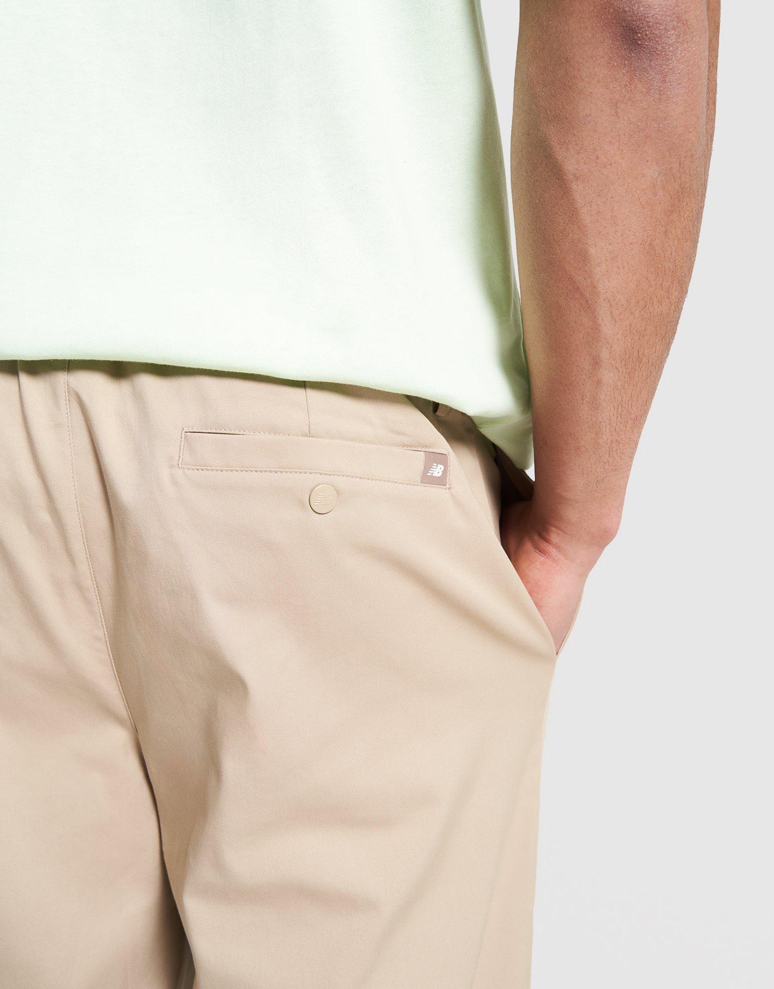 Мъжки панталони NEW BALANCE ПАНТАЛОНИ ATHLETICS STANDARD PANT 30" MP43560SOT Бежов