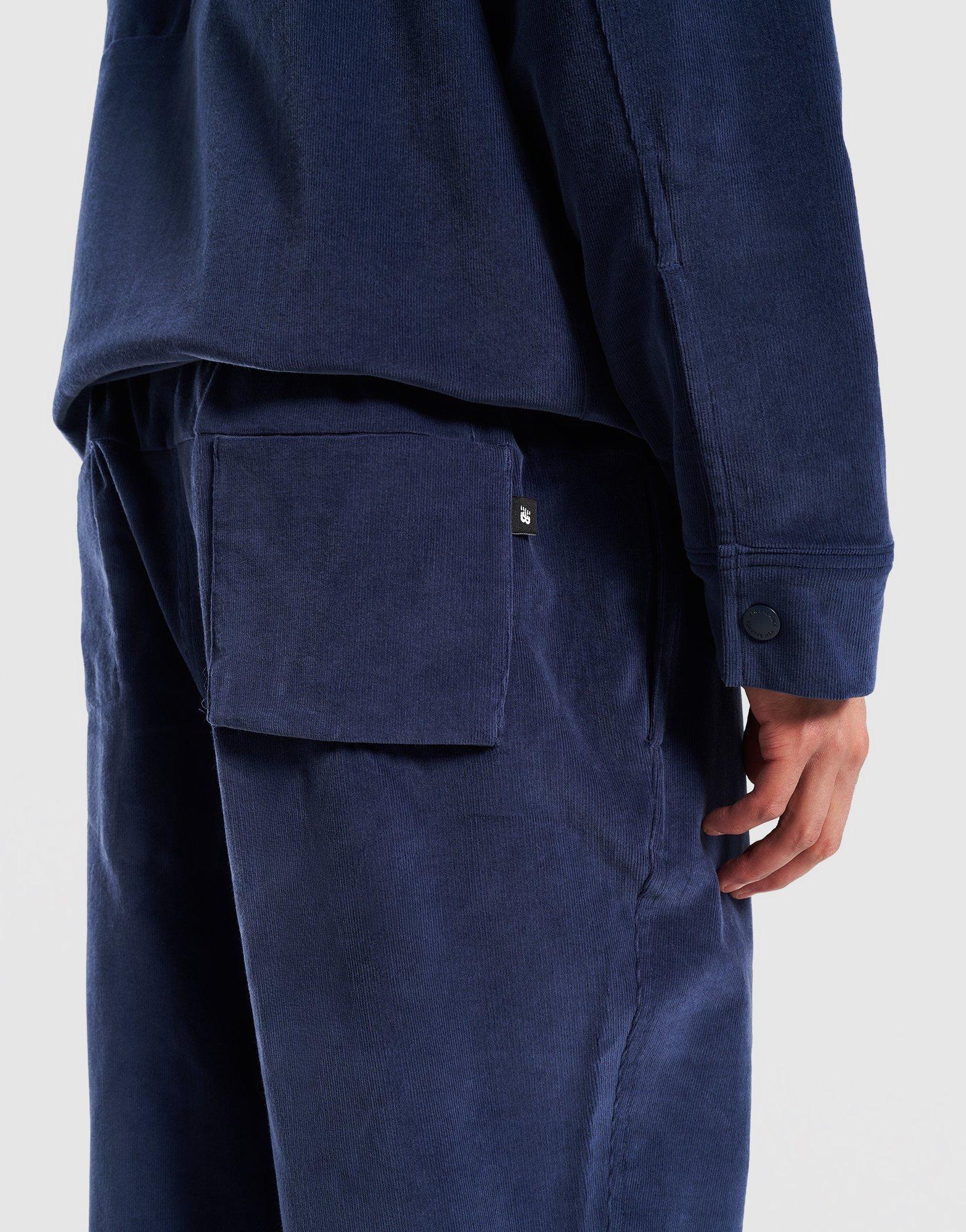 Мъжки панталони NEW BALANCE ПАНТАЛОНИ STRETCH CORDUROY PANT MP53521NNY Тъмносин