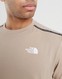 THE NORTH FACE TRICOU CHANGLA TAPE TEE FLAX