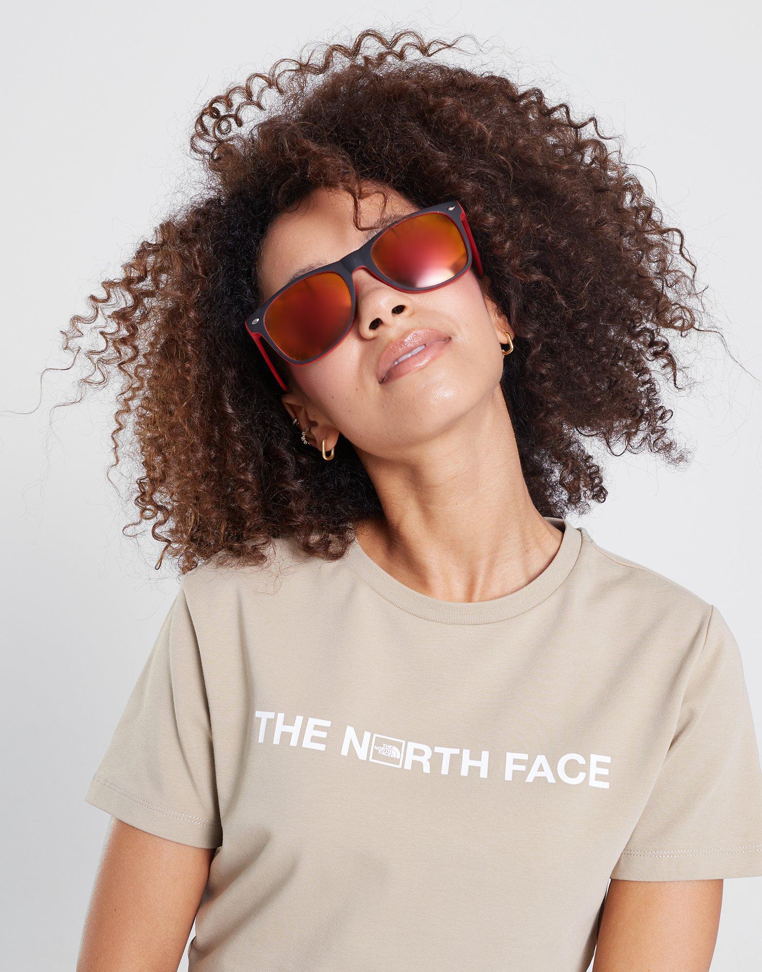 Moteriški marškinėliai THE NORTH FACE MARŠKINĖLIAI   OUTLINE GRAPHIC SS CR FLAX NF0A859CCEL1 Rusva