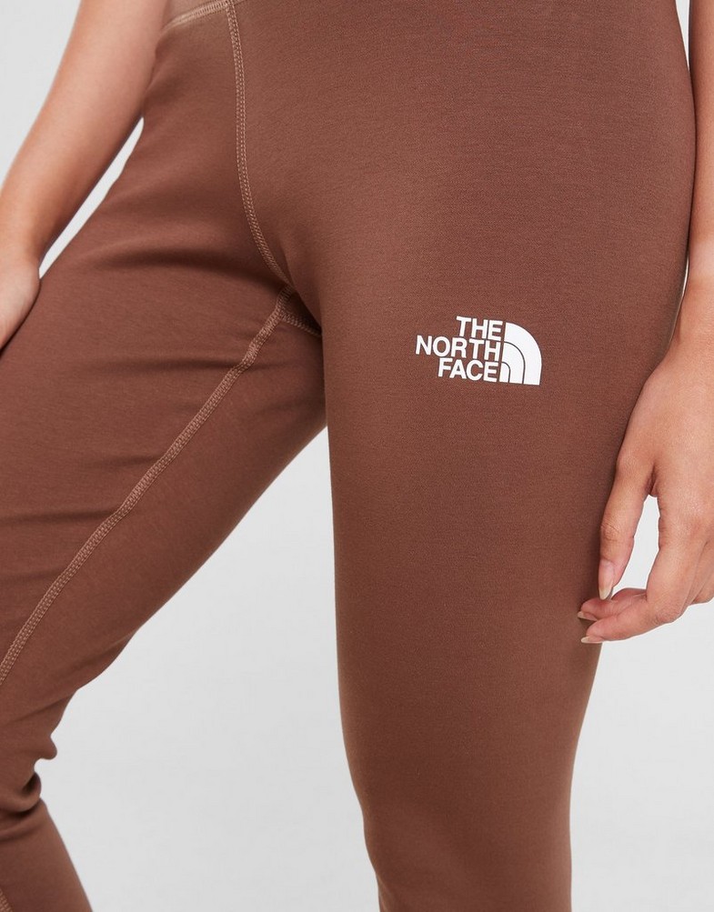 Colanți pentru femei THE NORTH FACE COLANȚI WORLD GRAPHIC LEGGIN BROWN NF0A85AL0KA1 Maro