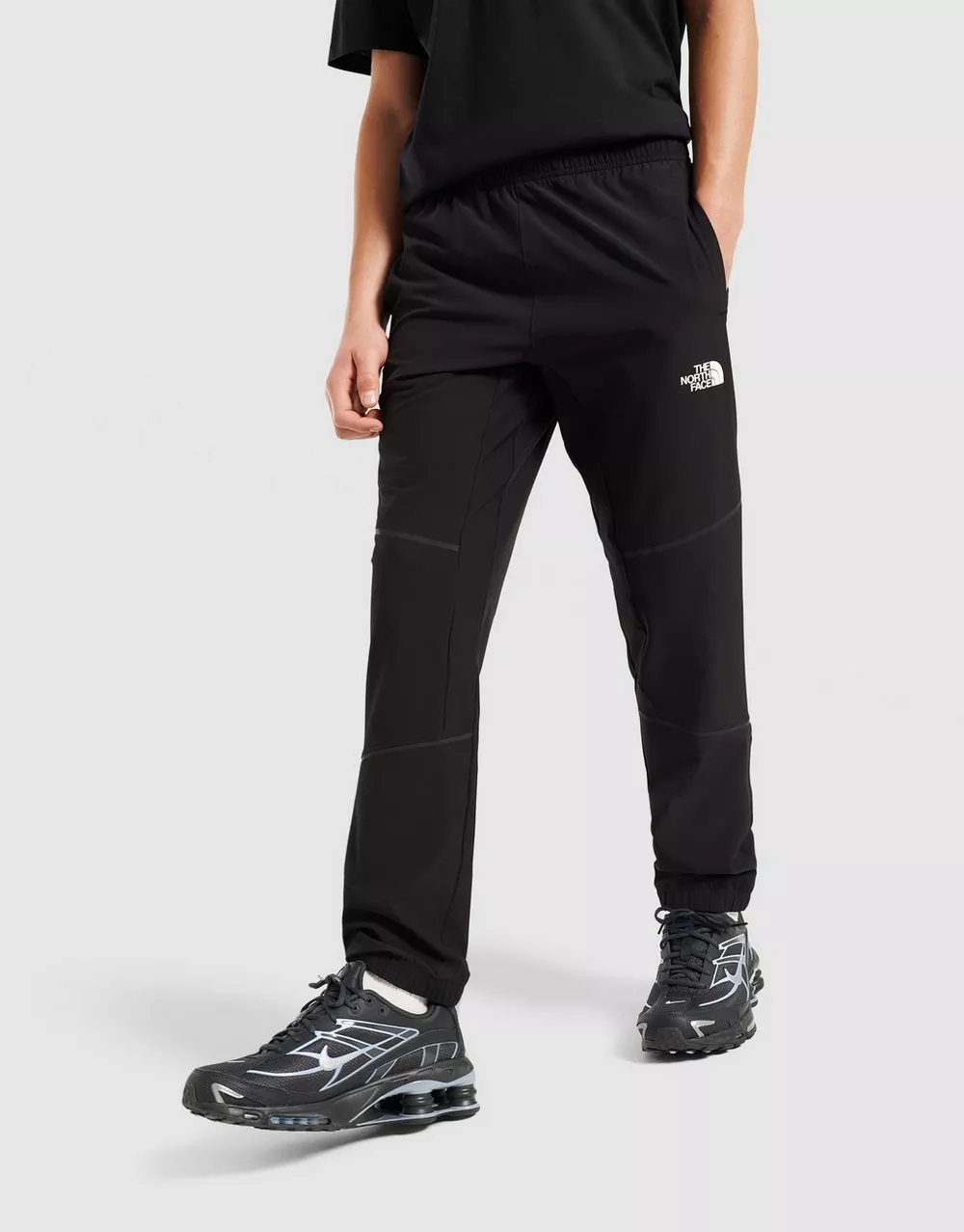 THE NORTH FACE ШТАНИ TEEN MOUNTAIN ATHLETICS WVN, фото 1 з 4