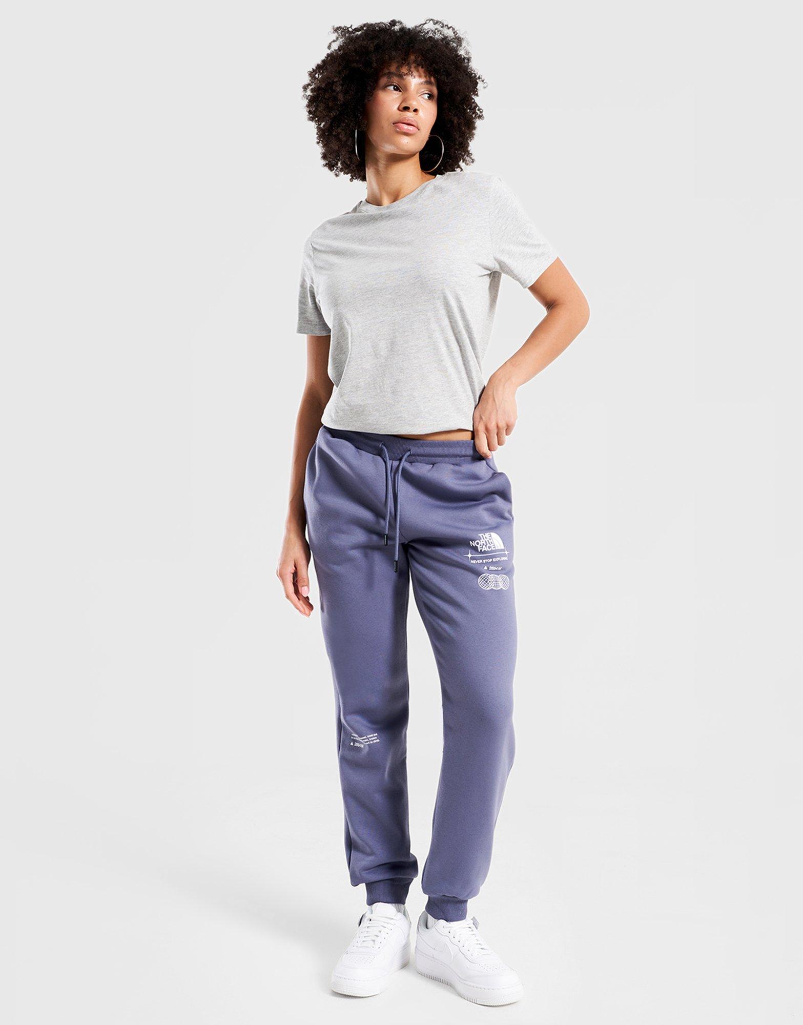 Pantaloni pentru femei THE NORTH FACE PANTALONI  W LOCATION GRAPHIC PANT NF0A8F7NBTR1 Bleumarin