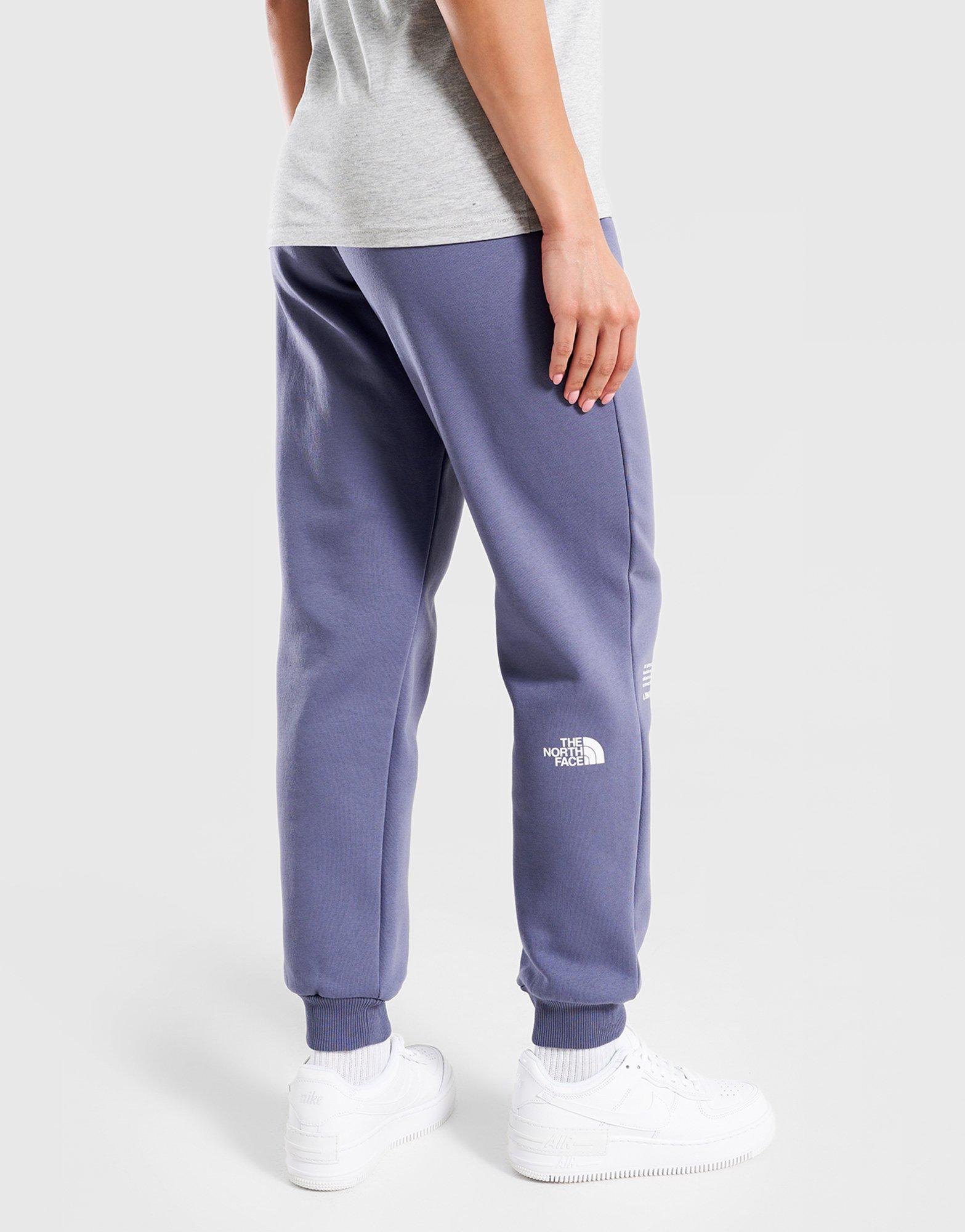 Pantaloni pentru femei THE NORTH FACE PANTALONI  W LOCATION GRAPHIC PANT NF0A8F7NBTR1 Bleumarin