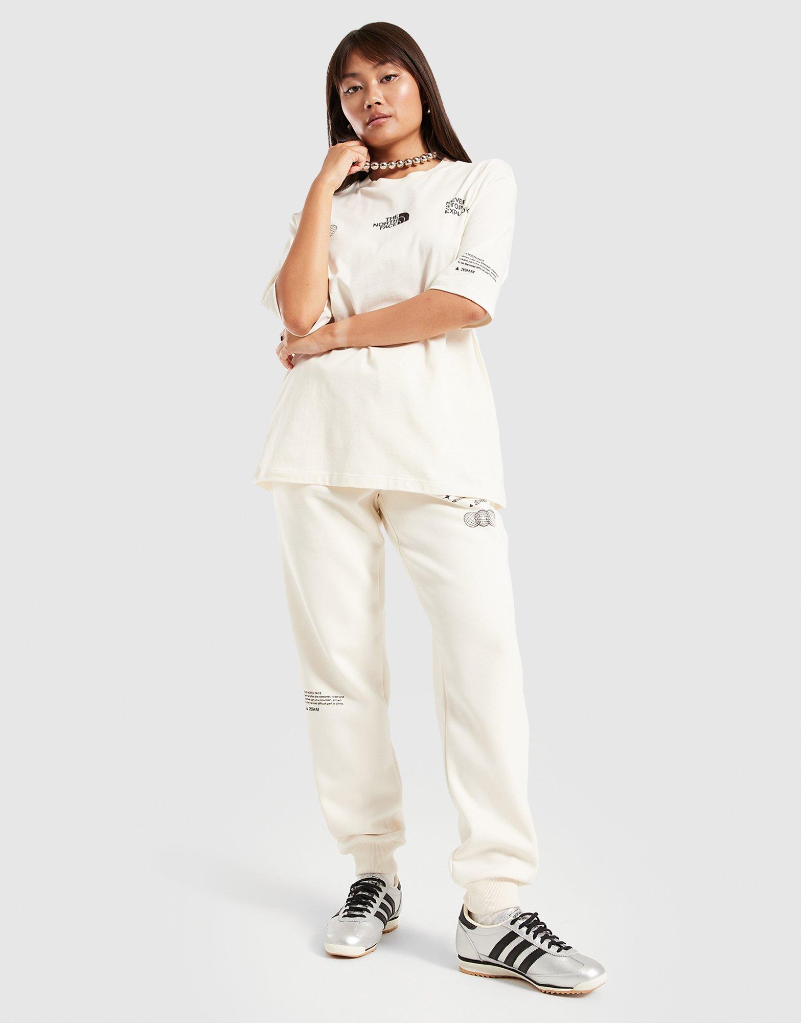 Жіночі футболки THE NORTH FACE ФУТБОЛКА LOCATION OVERSIZE TEE NF0A8F7VQLI1 Бежевий