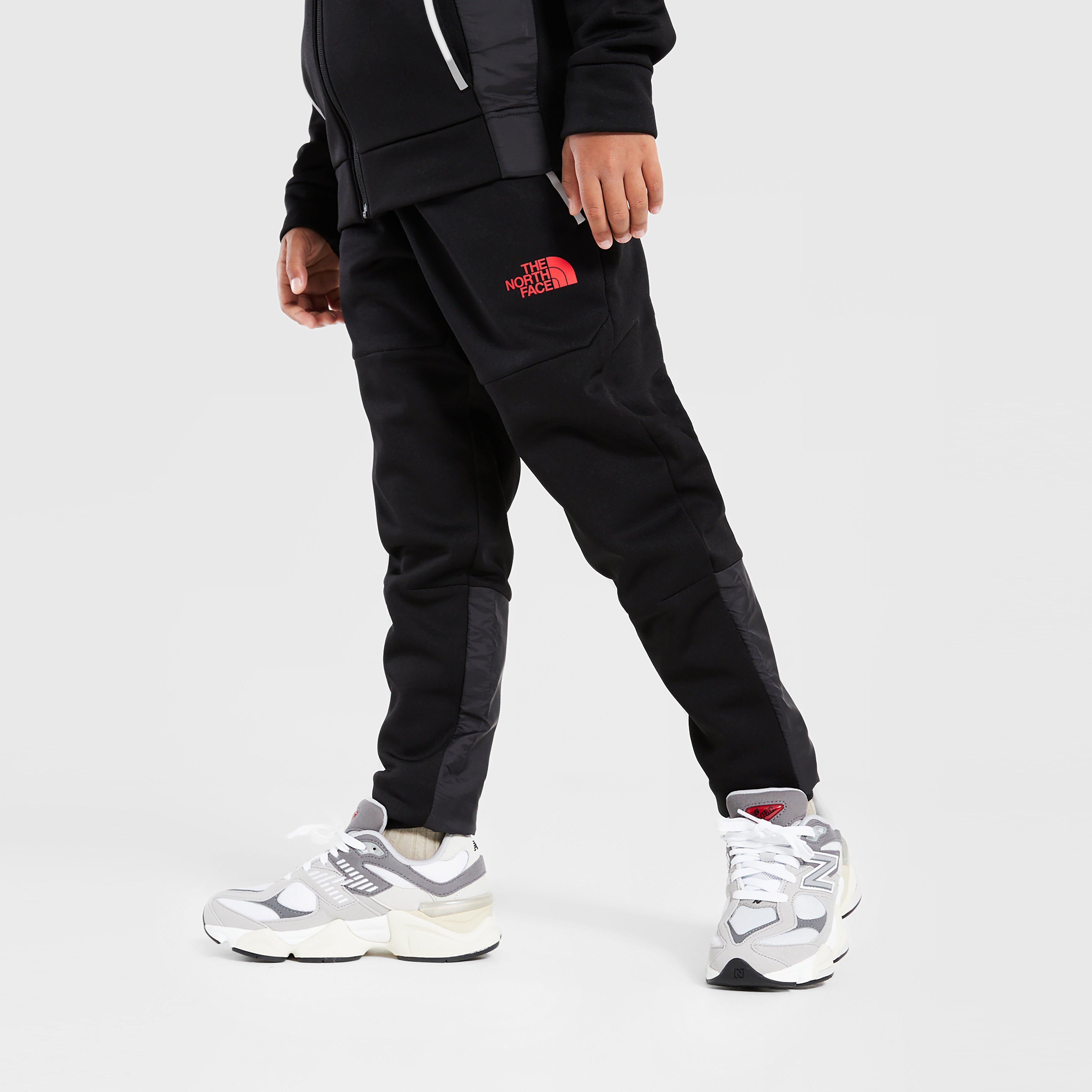 Gyerek melegítőnadrág és jogger THE NORTH FACE NADRÁG MITT PT BLACK/RED