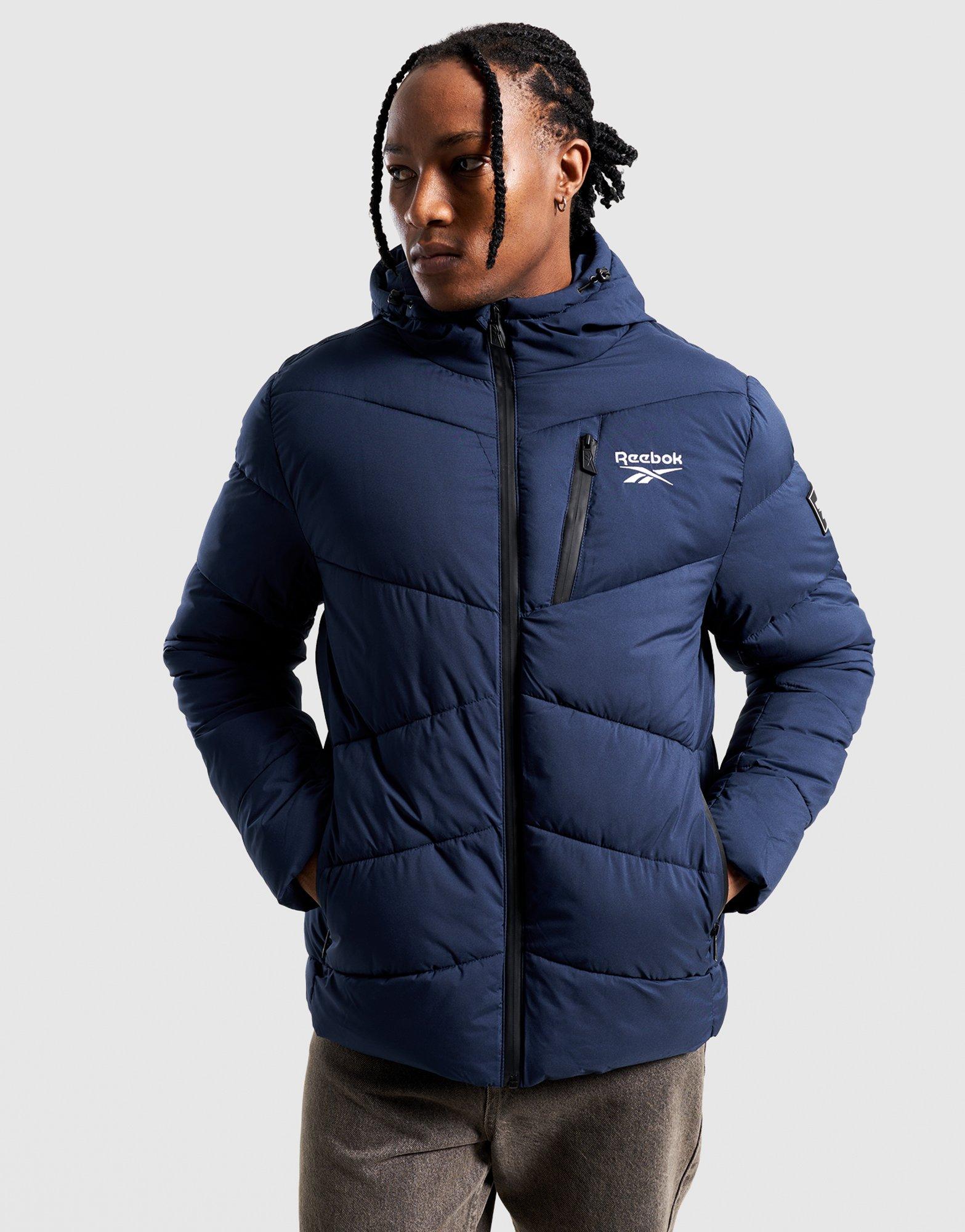 REEBOK BUNDA ZIMNÁ STRETCH PUFFER JACKET OMRB1567_VECTOR NAVY Modrá
