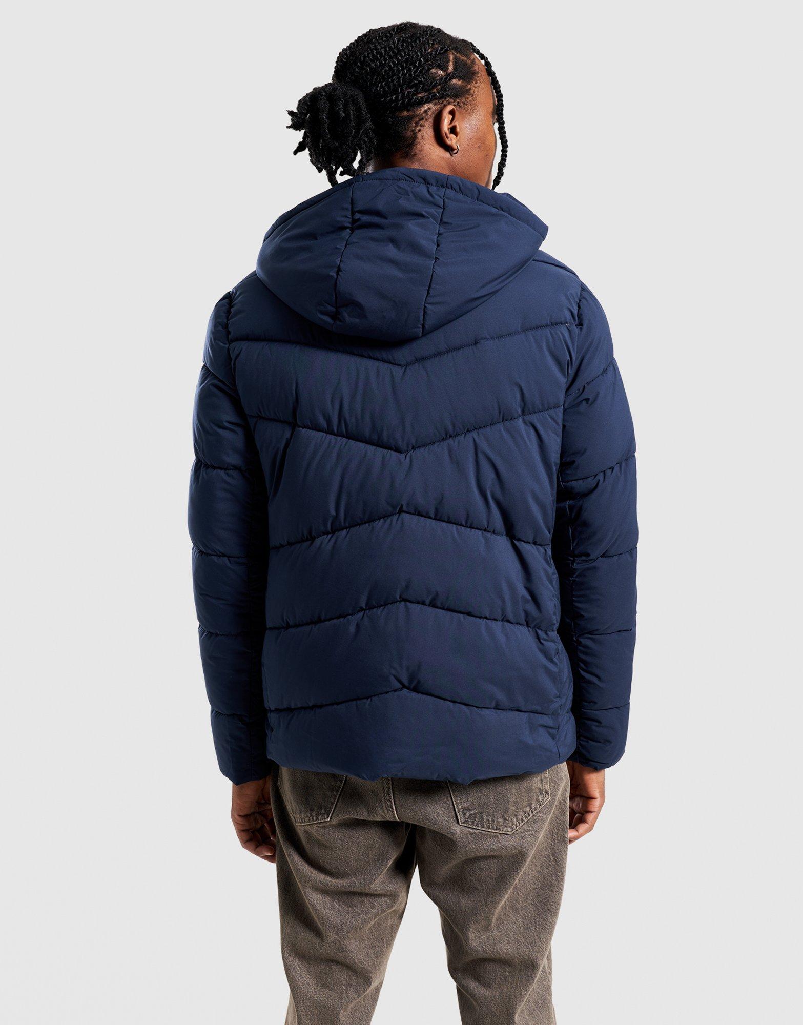 REEBOK BUNDA ZIMNÁ STRETCH PUFFER JACKET OMRB1567_VECTOR NAVY Modrá
