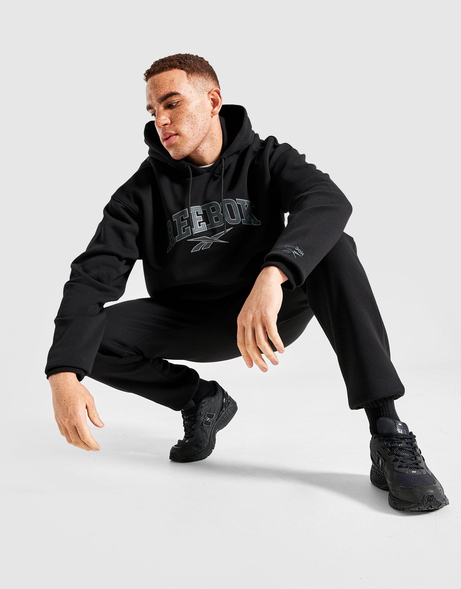 Férfi pulóverek REEBOK PULÓVER KAPUCNIS BRYNE RK25096MGM100003 Fekete