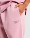 REEBOK PANTALONI  TIA