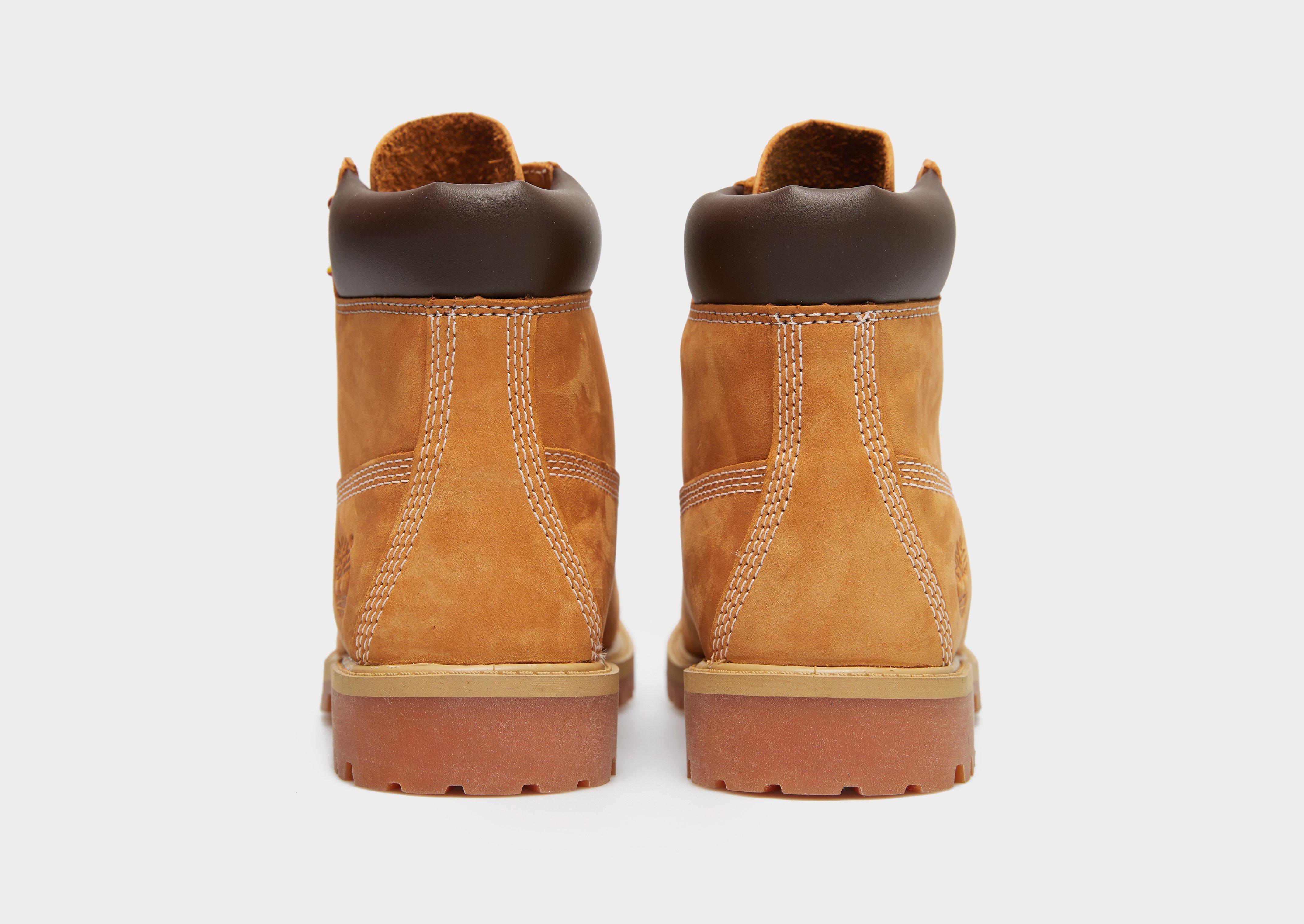 Дитяче зимове взуття TIMBERLAND 6 IN PREMIUM WP BOOT TB1129097131 Золотистий