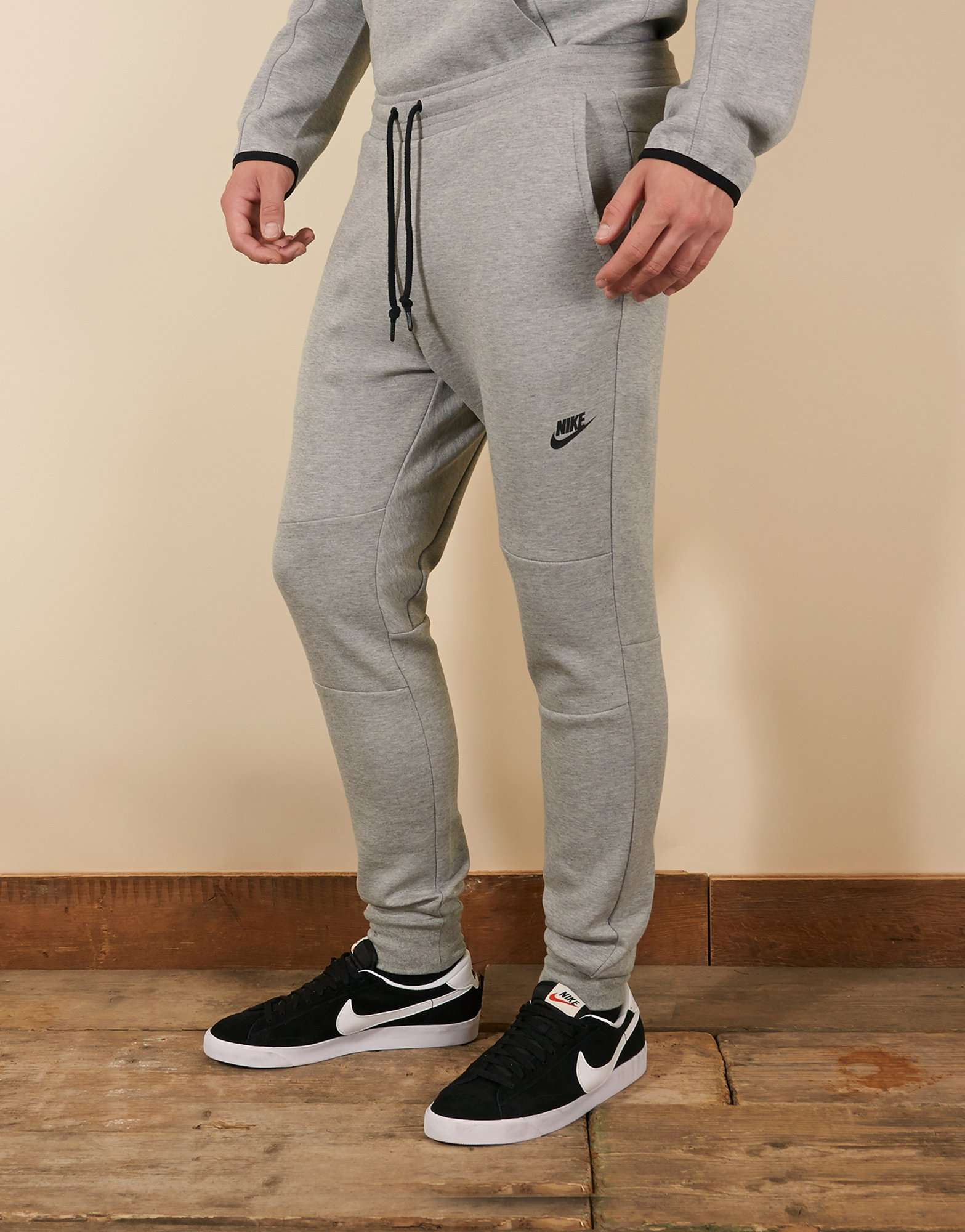 white nike tech pants
