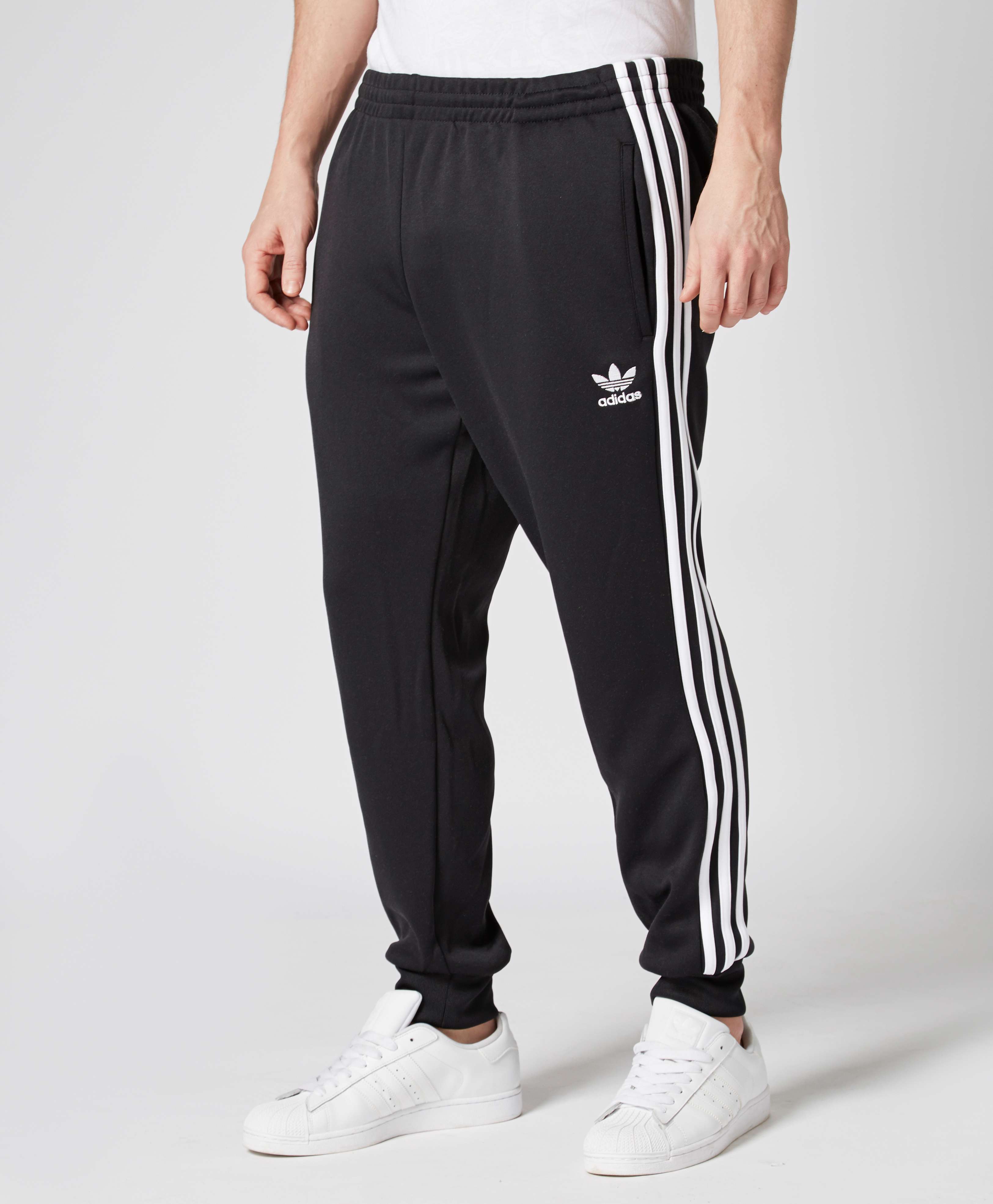 black cuffed track pants