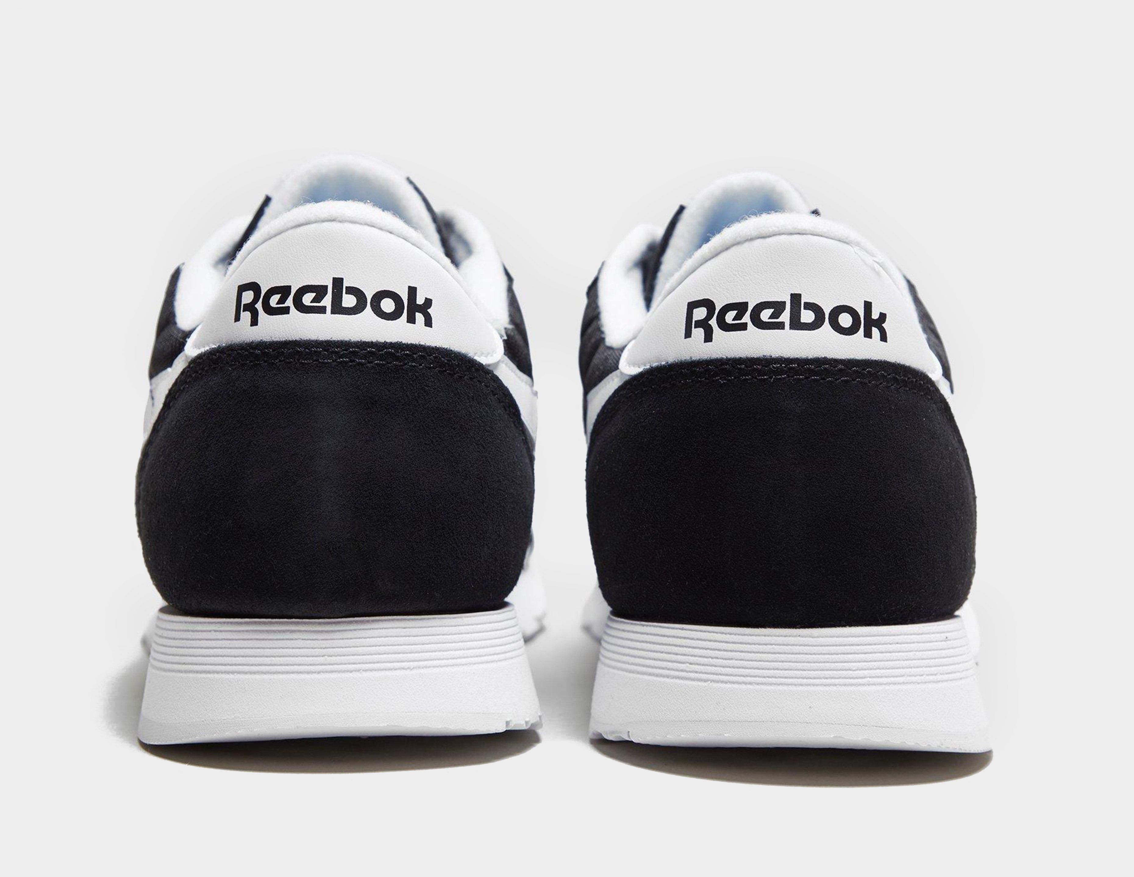 irving logo and metallic leather stripe sneaker